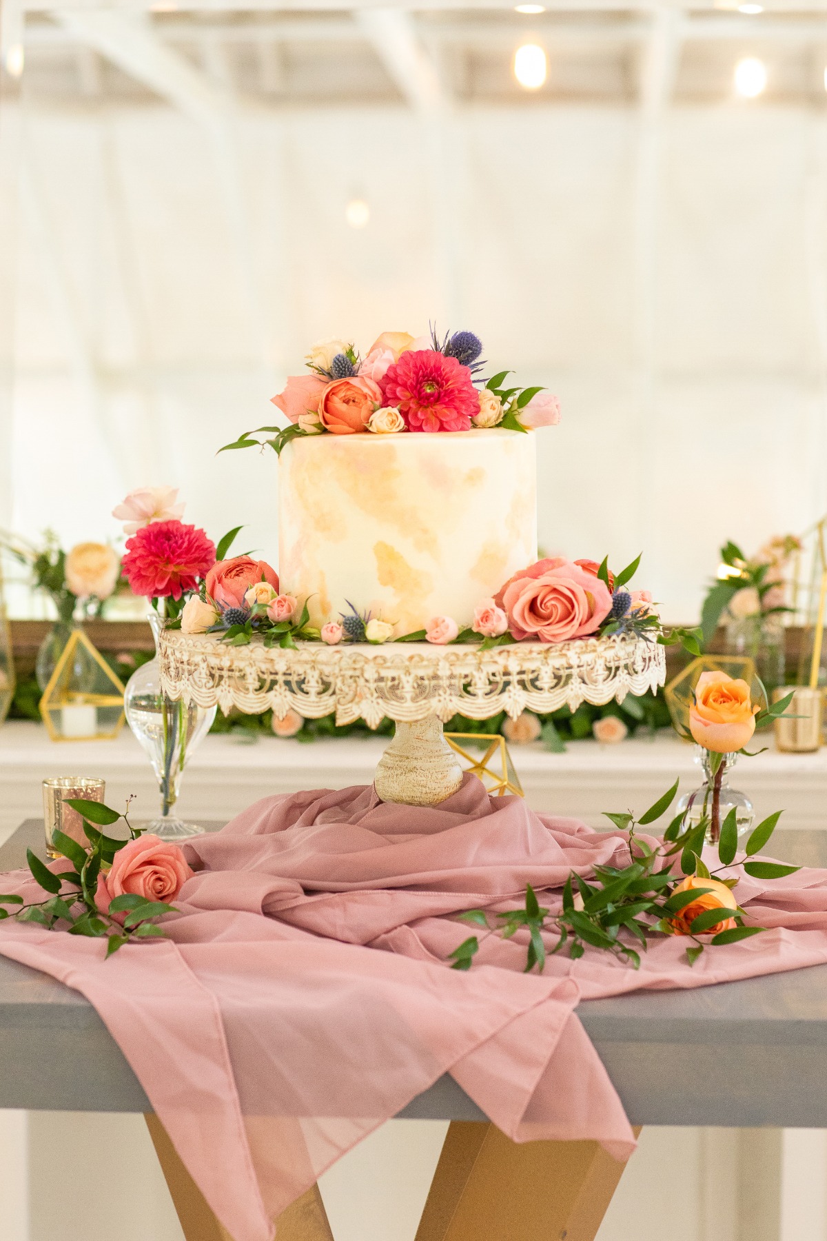 watercolor wedding cake adorned with florals