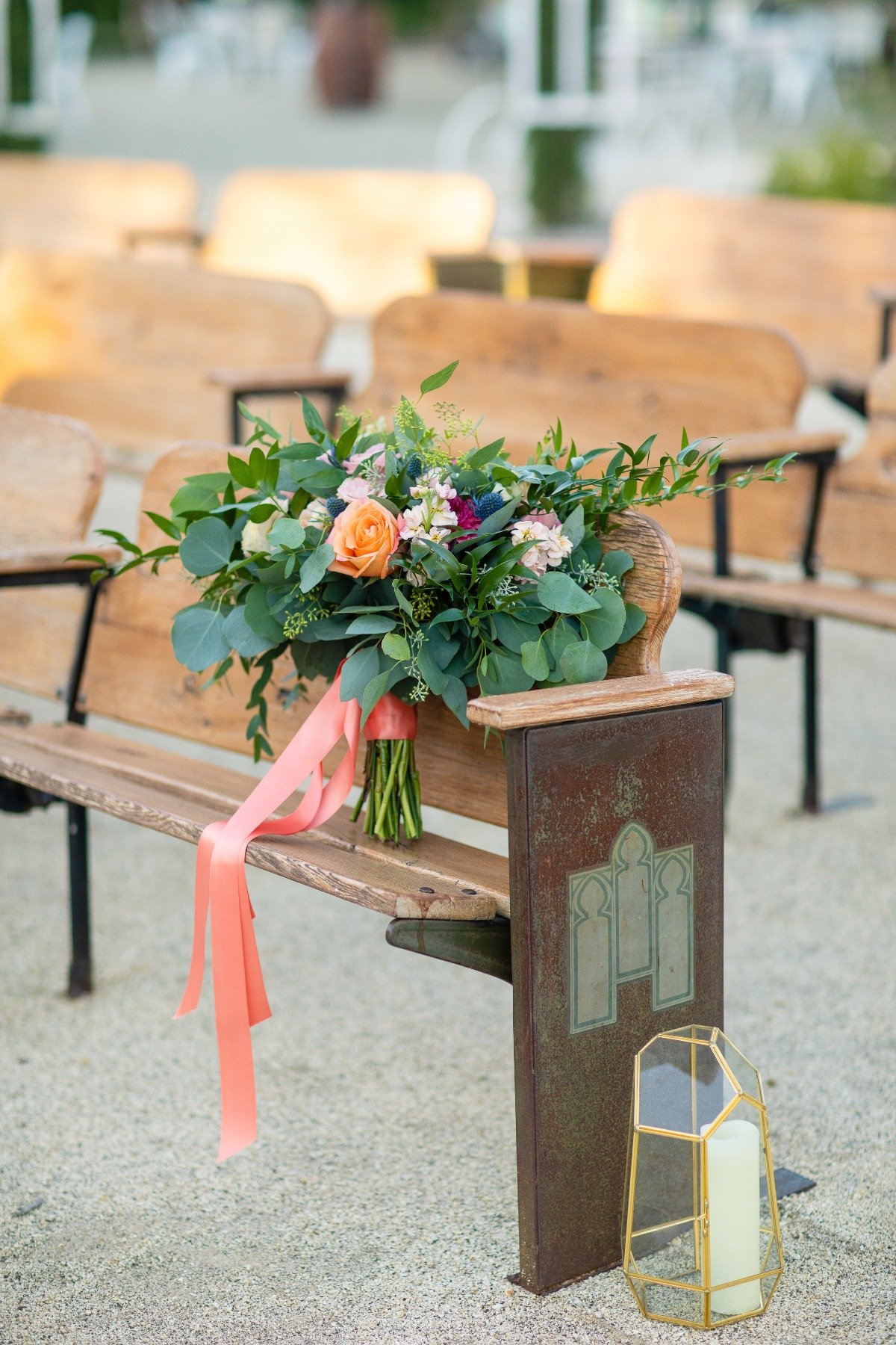 church pews used at outdoor wedding ceremony
