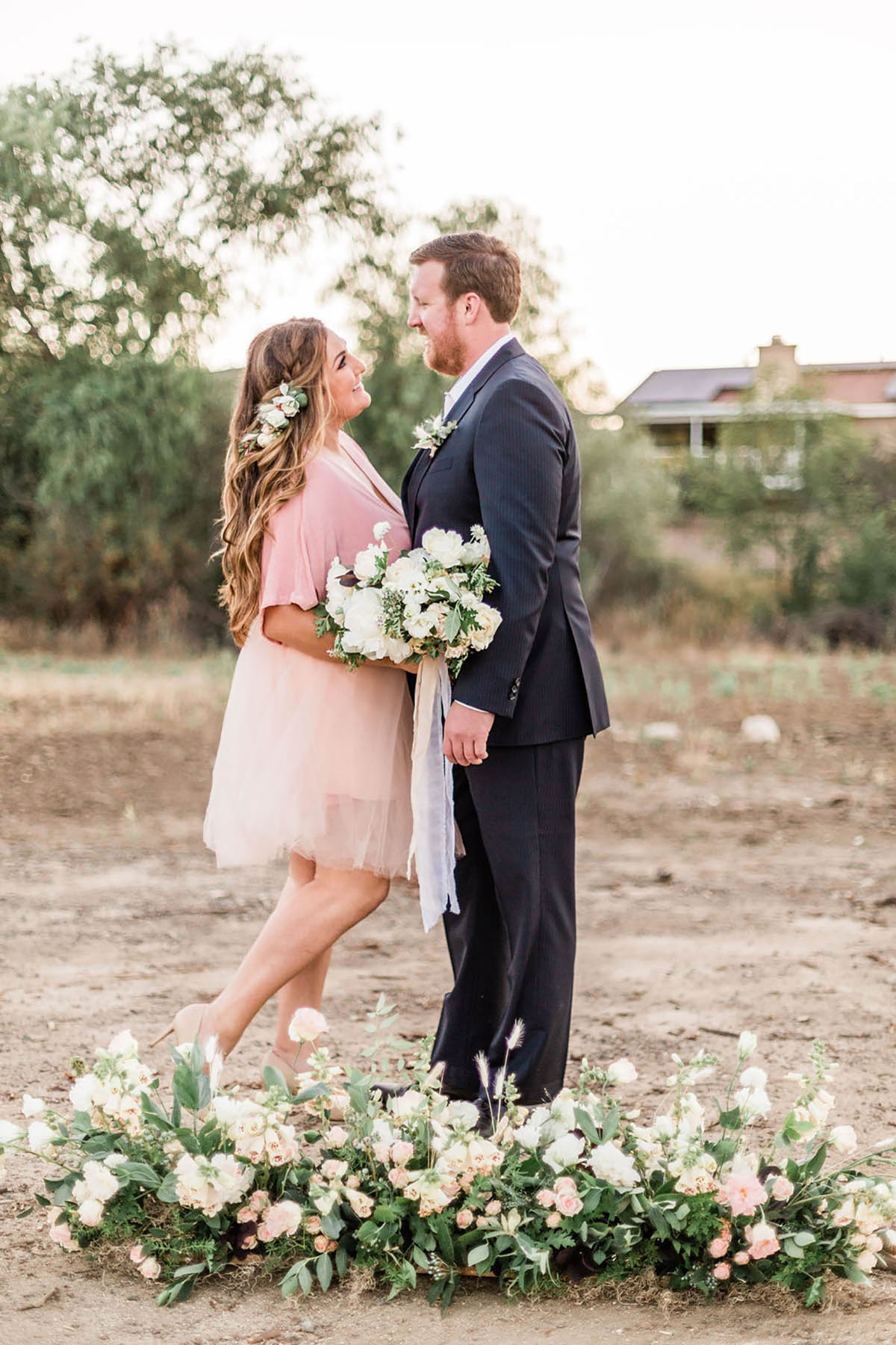 Bride and groom gaze at each other during their wedding day
