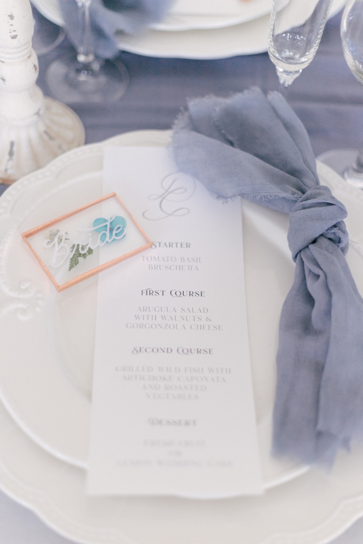 wedding menu with blue napkins