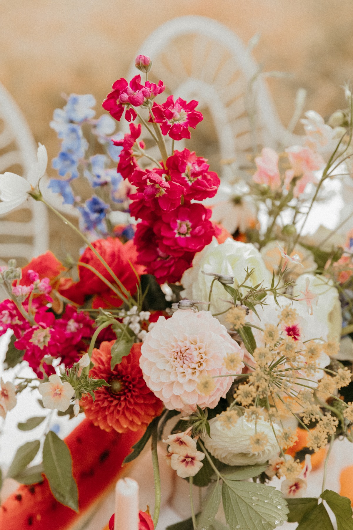 Floral centerpiece with dahlias and watermelon decor