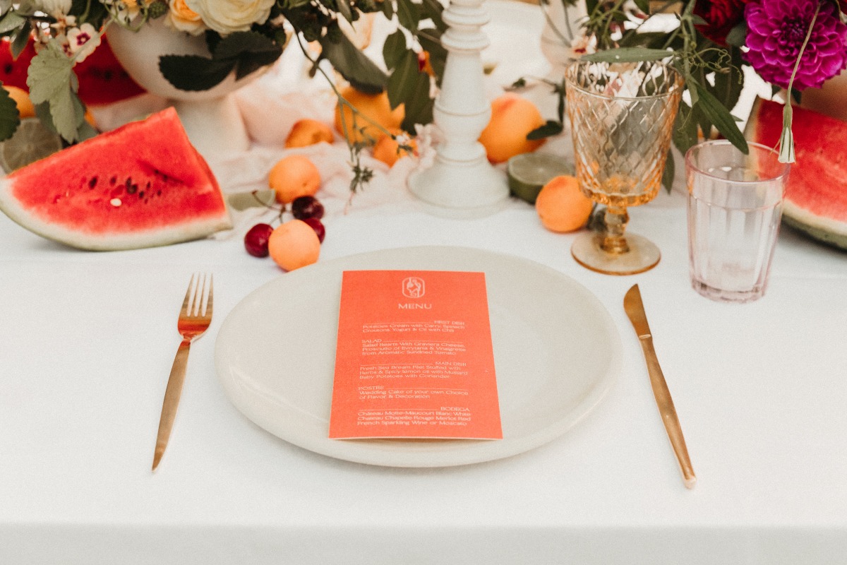 Elegant tablescape with fruit flowers and menu card
