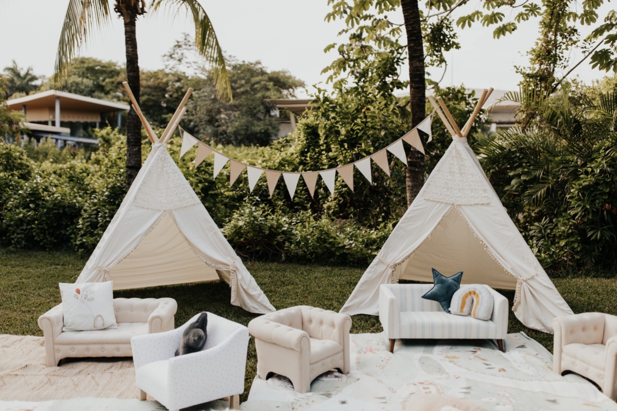 Kids teepee play area with miniature sofas