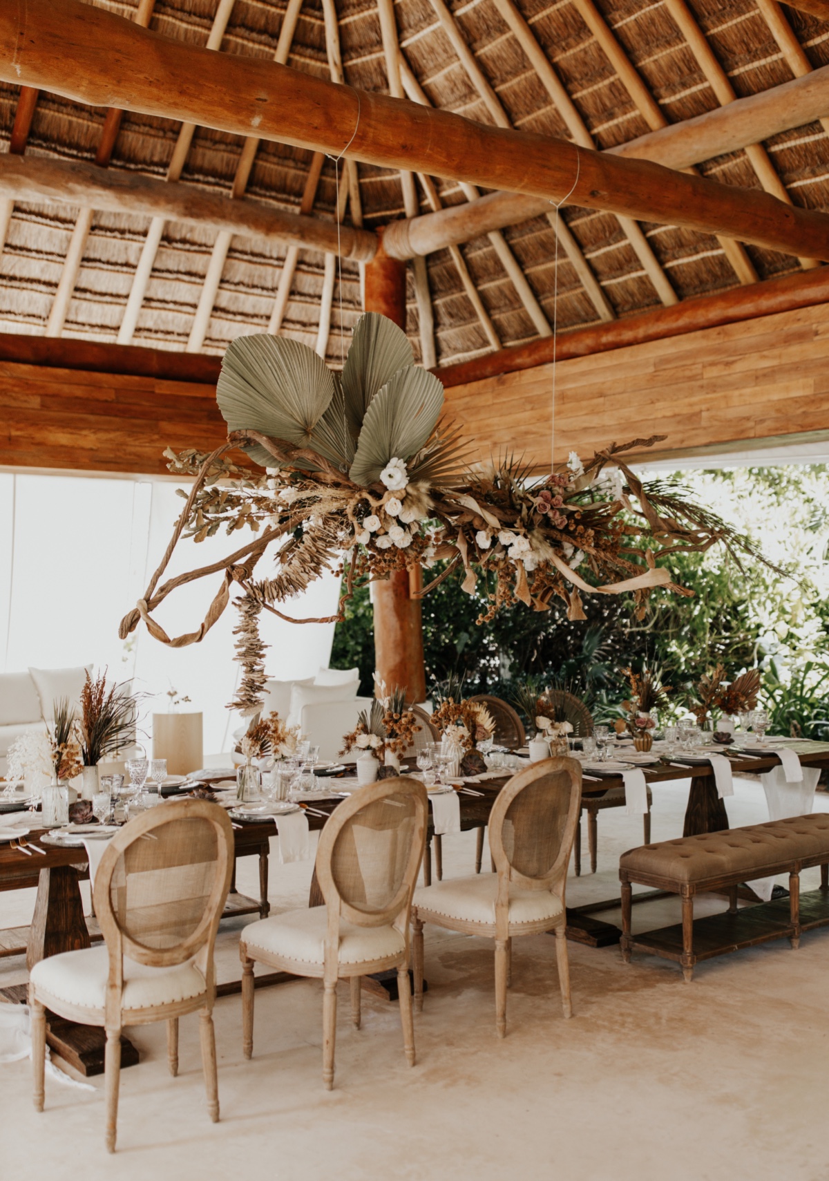 Elegant wedding reception table with floral centerpiece