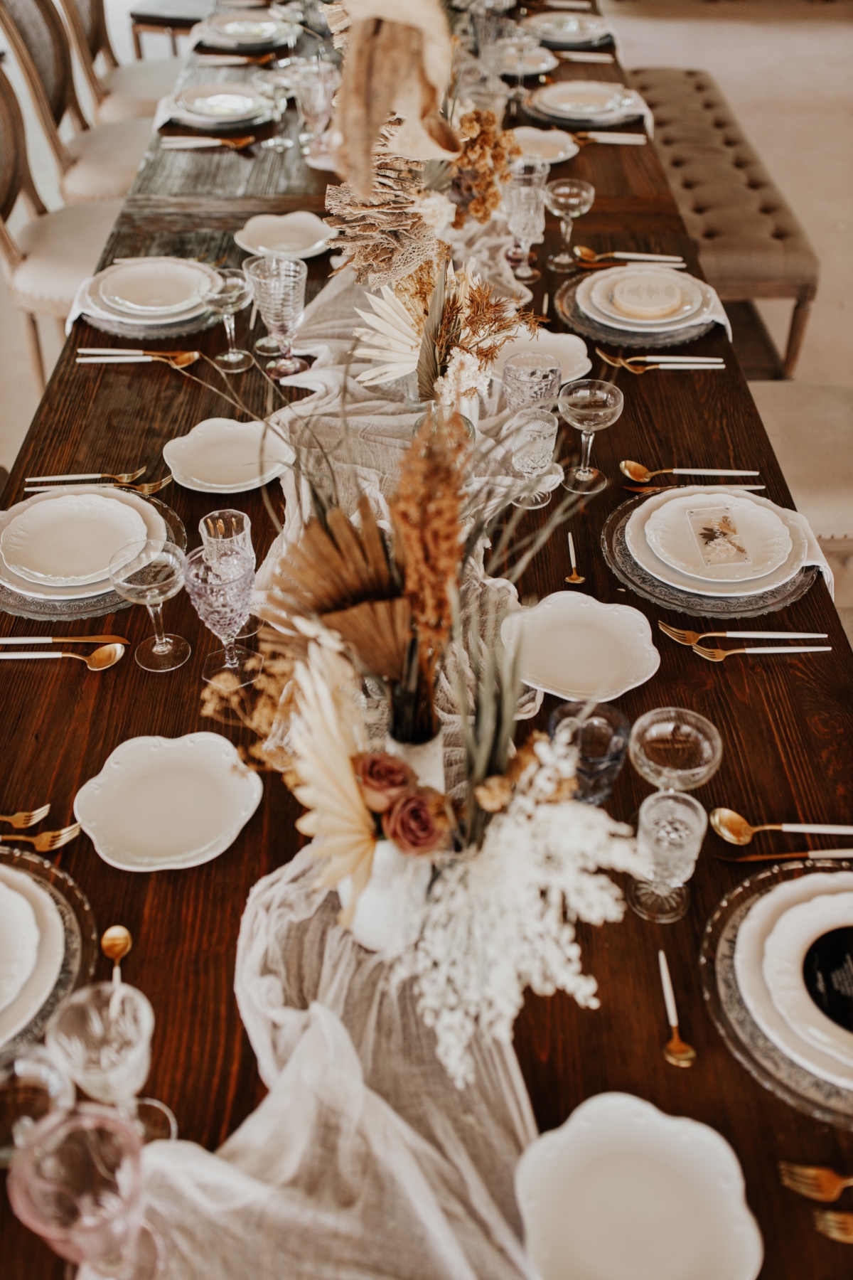 Elegant wedding table setting with floral centerpiece