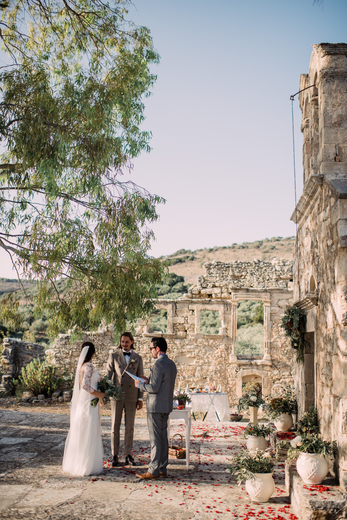 Rustic outdoor wedding ceremony at ancient ruins