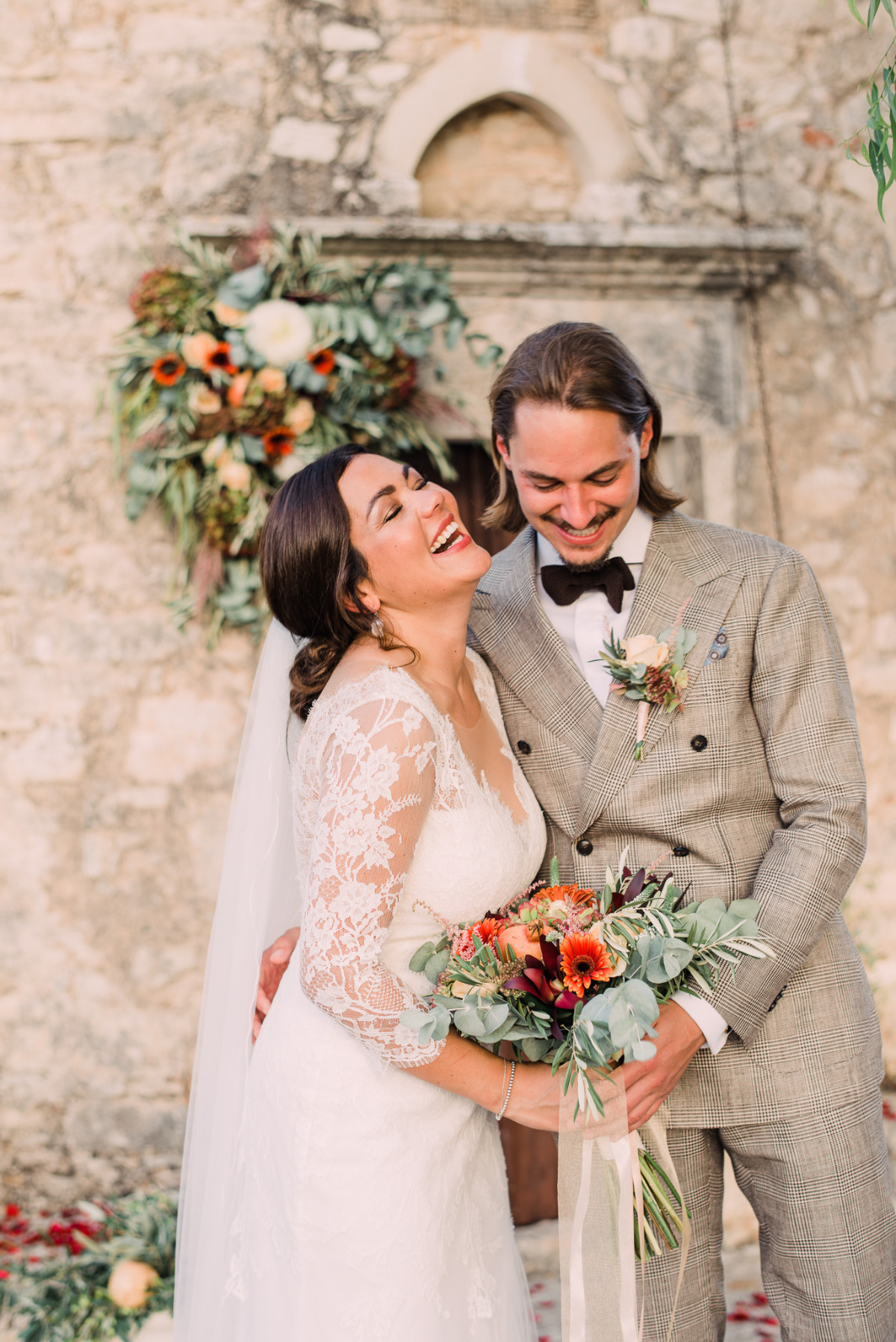 Laughing bride and groom at their destination wedding