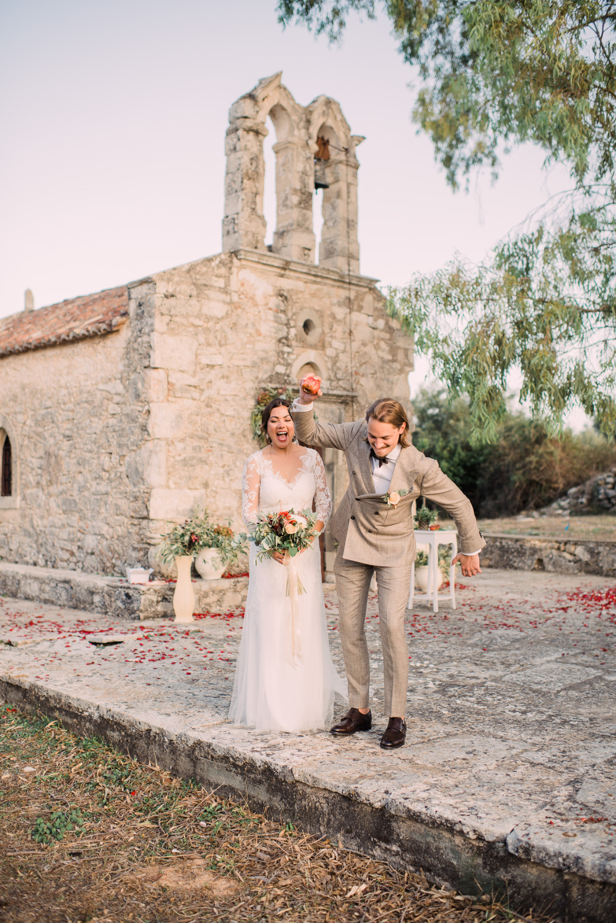 Newlyweds celebrate their joyful wedding at an old church