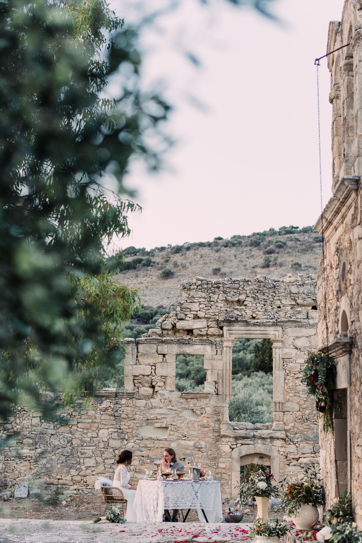 Romantic couple dining amidst ancient ruins