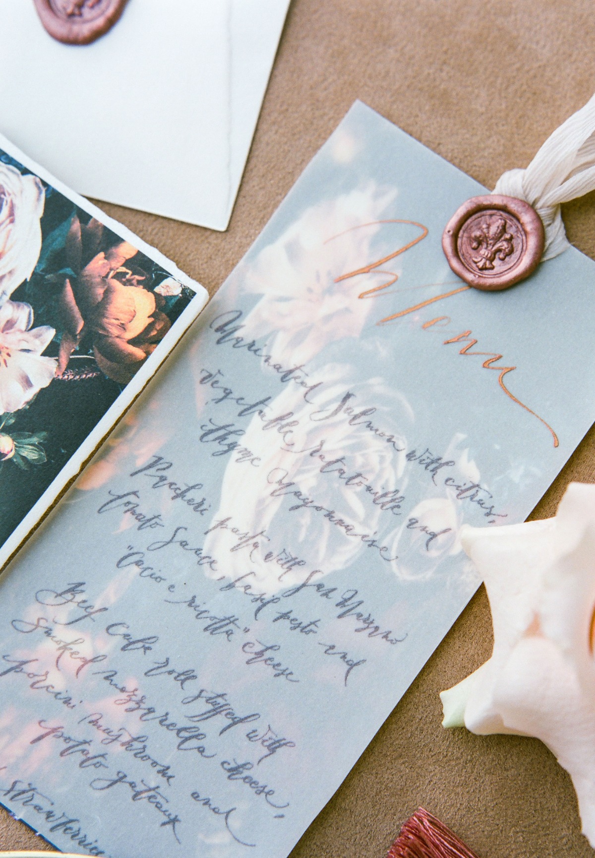Elegant wedding menu with floral design and calligraphy