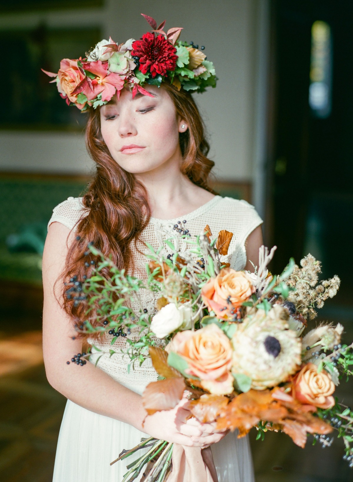 Beautiful bride with flower crown and bridal bouquet