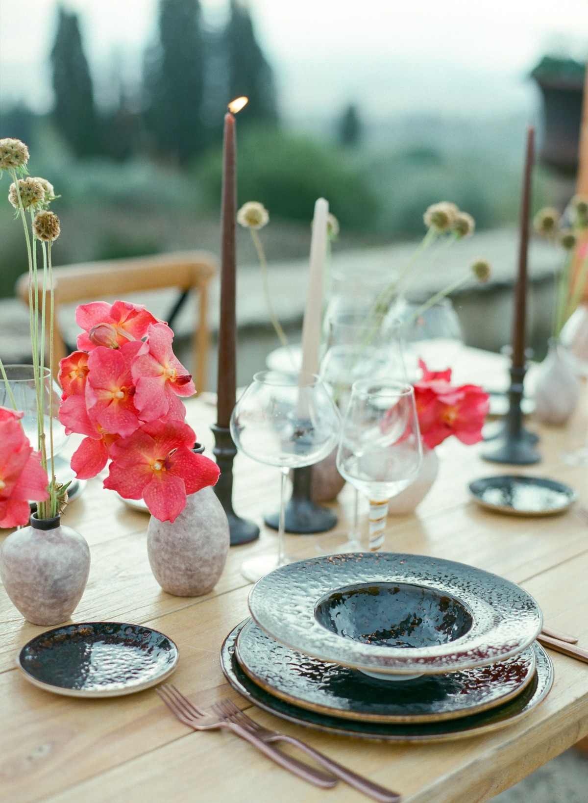 Elegant table setting with flowers and candles for a romantic dinner