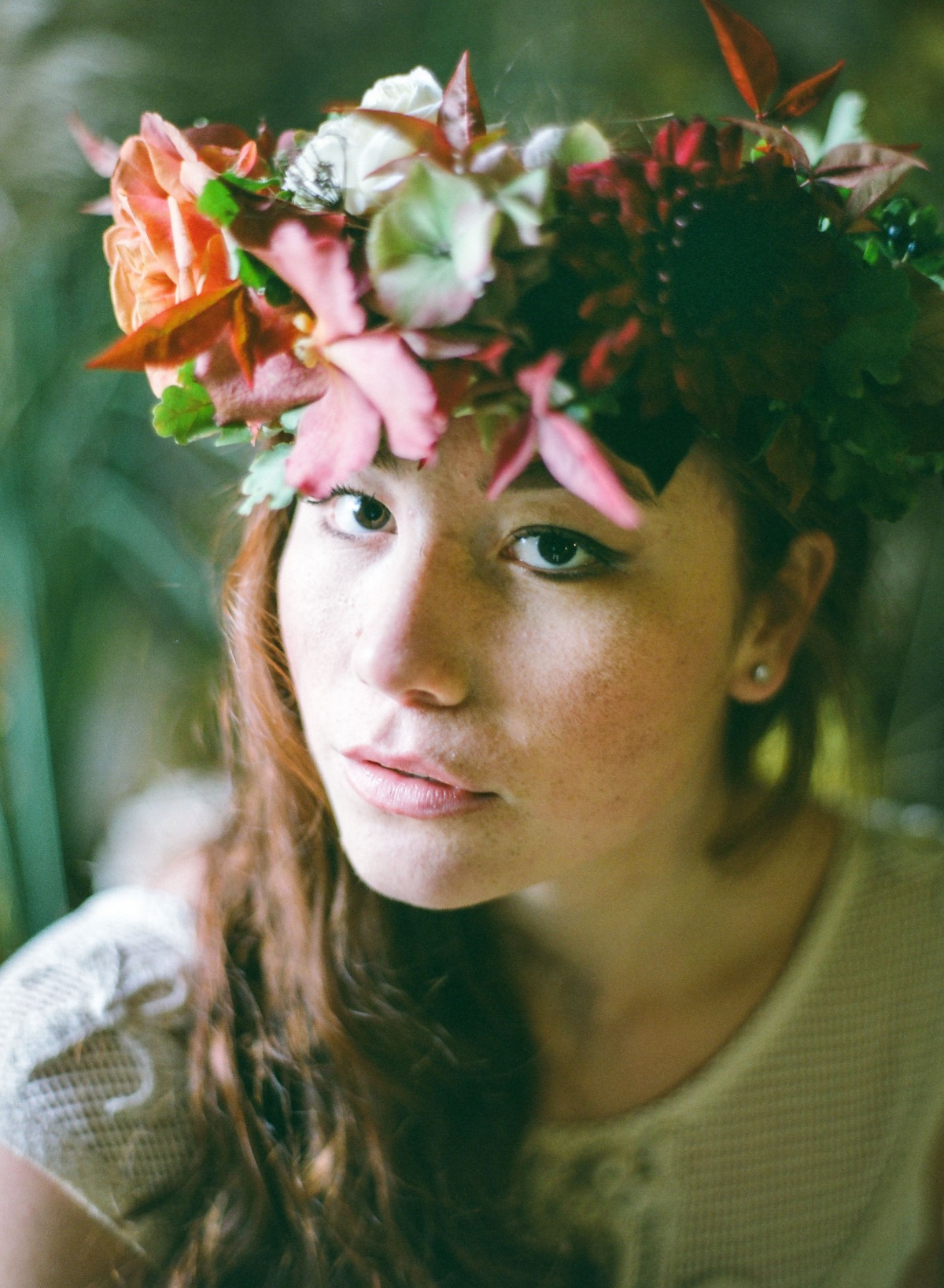 Woman wearing a flower crown with a soft focus portrait
