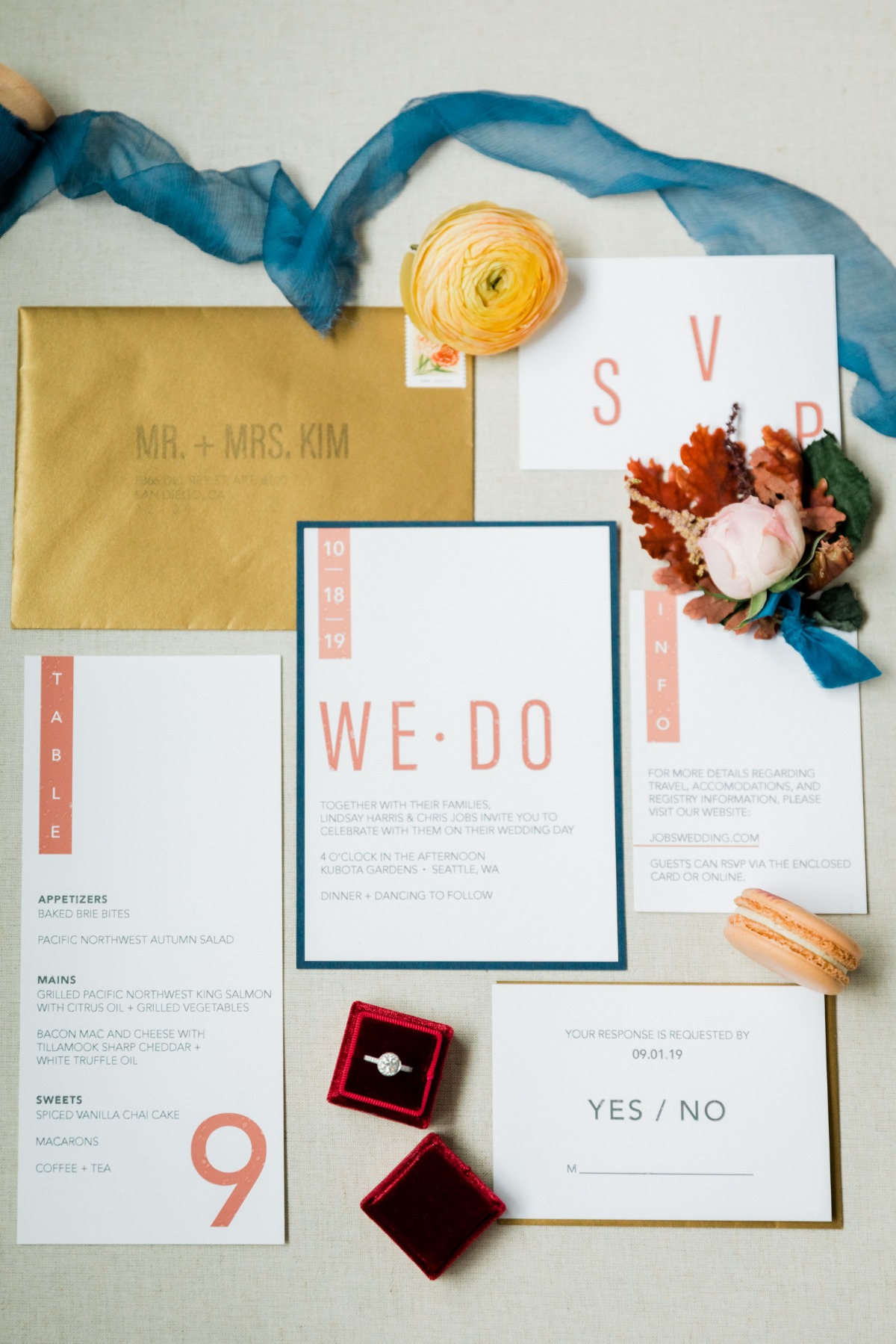 Elegant wedding invitation suite with floral accents