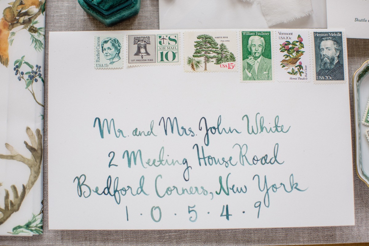 Wedding invitation envelope calligraphy and vintage stamps