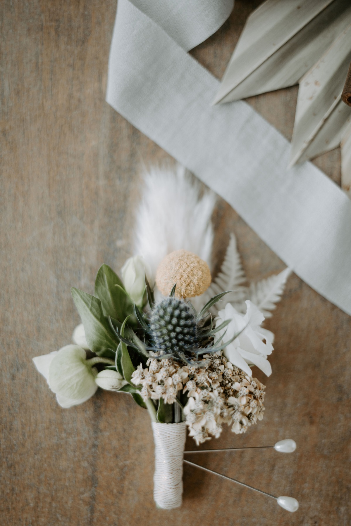 Elegant rustic wedding boutonniere with wildflowers