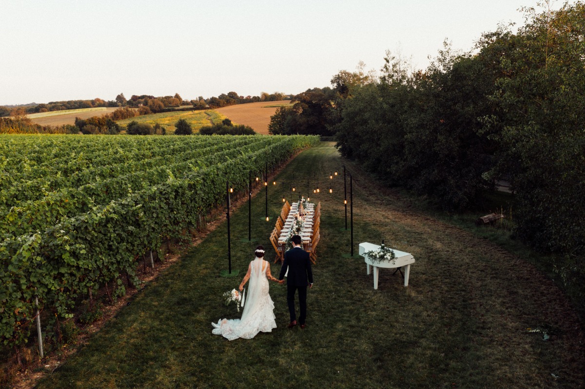 Tuscan Vineyard themed micro wedding with vineyard tablescape and barn ceremony.