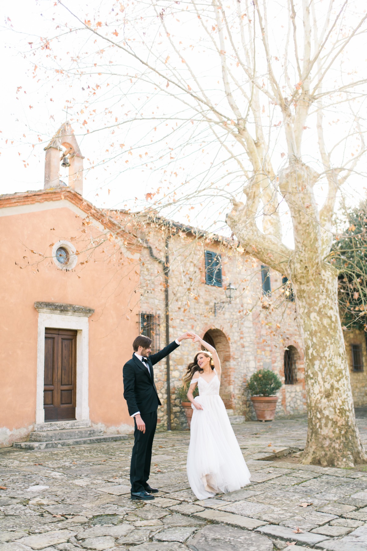 This Awe-Inspiring Shoot In Tuscany Has Us Lusting for a Fall Wedding Surrounded By Cypress Trees