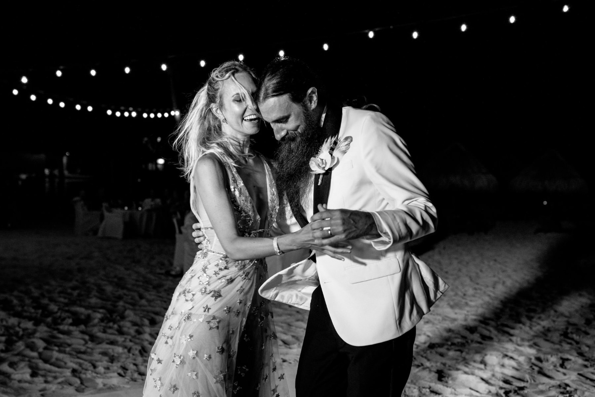 Happy couple's first dance at night wedding