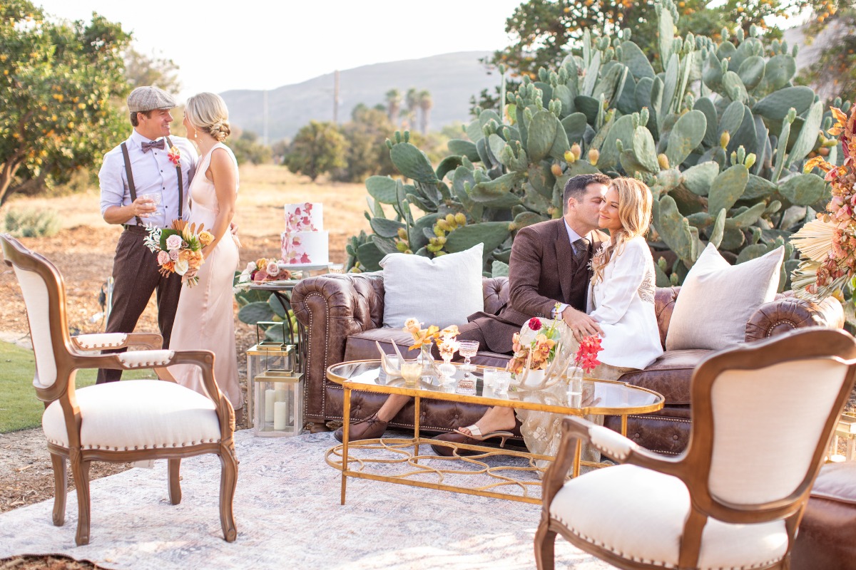 Romantic outdoor wedding reception with two couples