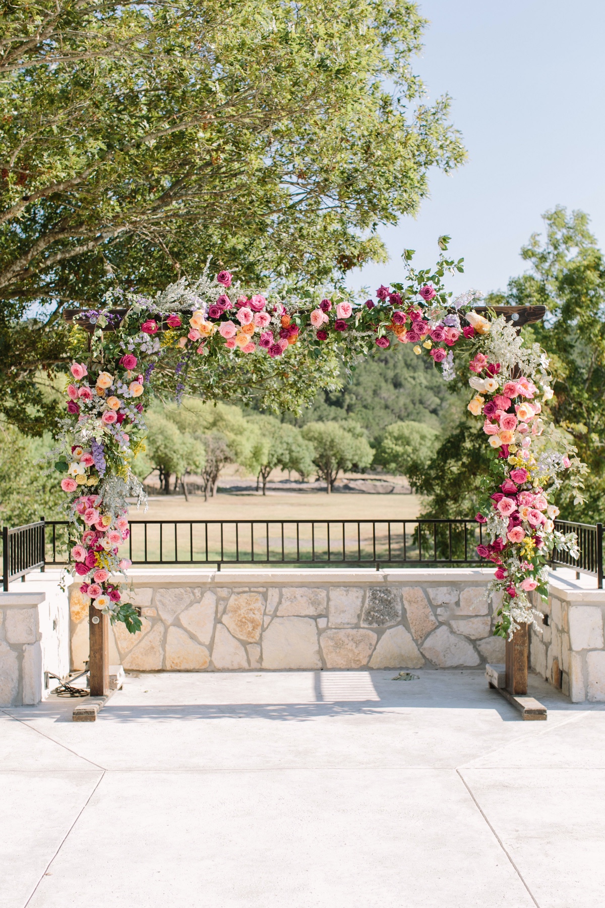 How To Have A Lavish Ranch Wedding With Bold Florals + Blue Bridesmaids