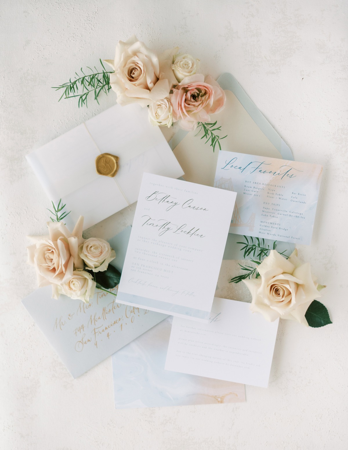 Elegant wedding stationery suite with roses detail