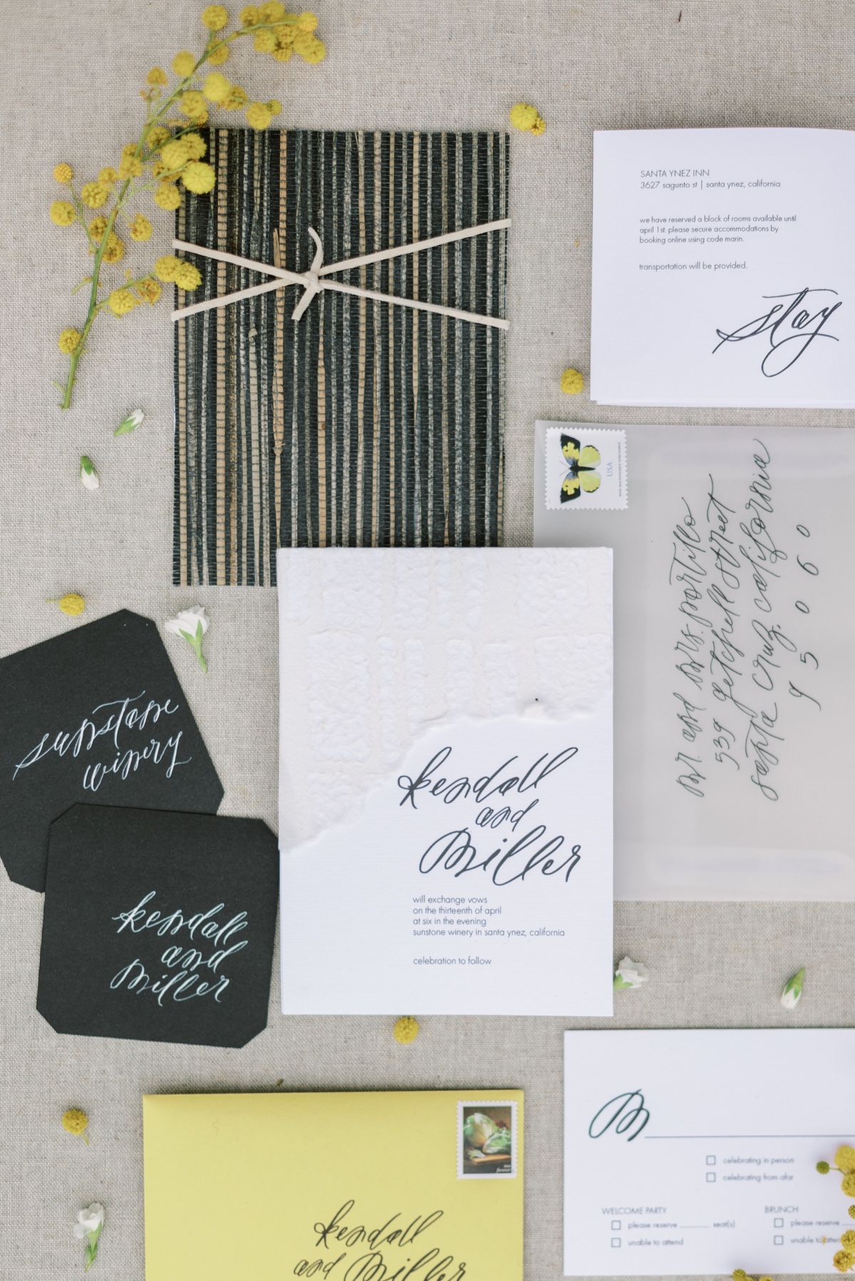 Elegant wedding invitation suite with yellow accents