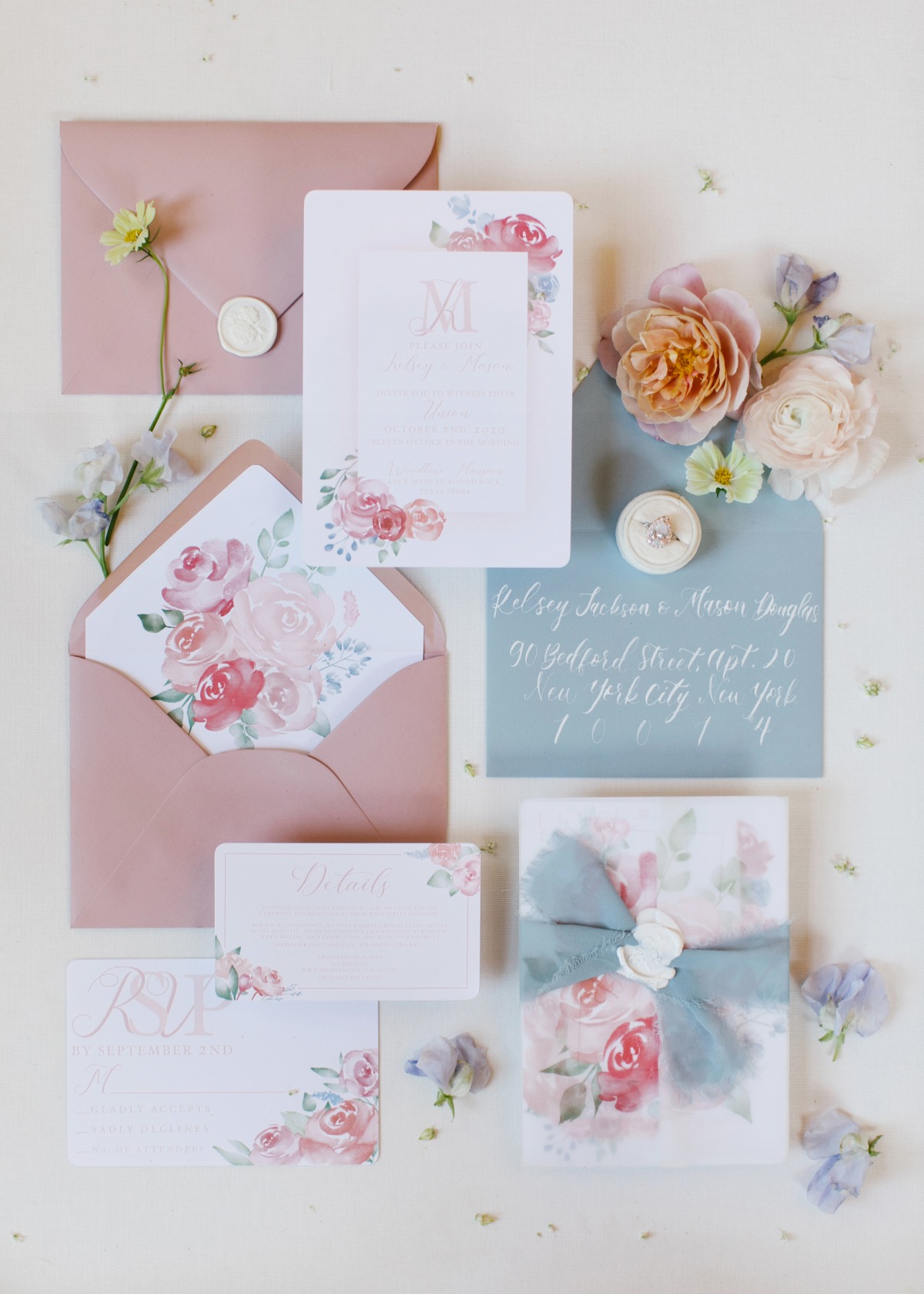 Elegant wedding invitation suite with watercolor floral design