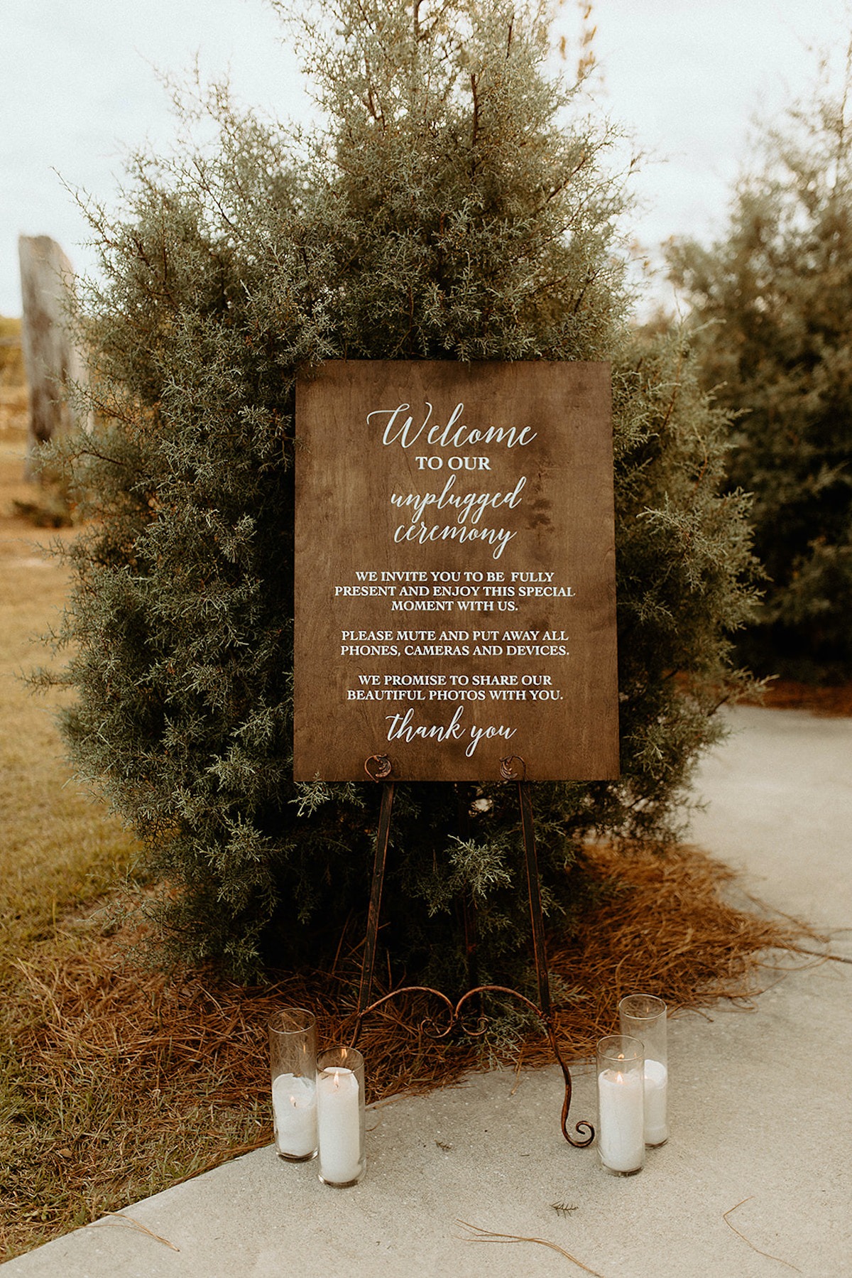 Wedding sign with welcome message and unplugged ceremony request
