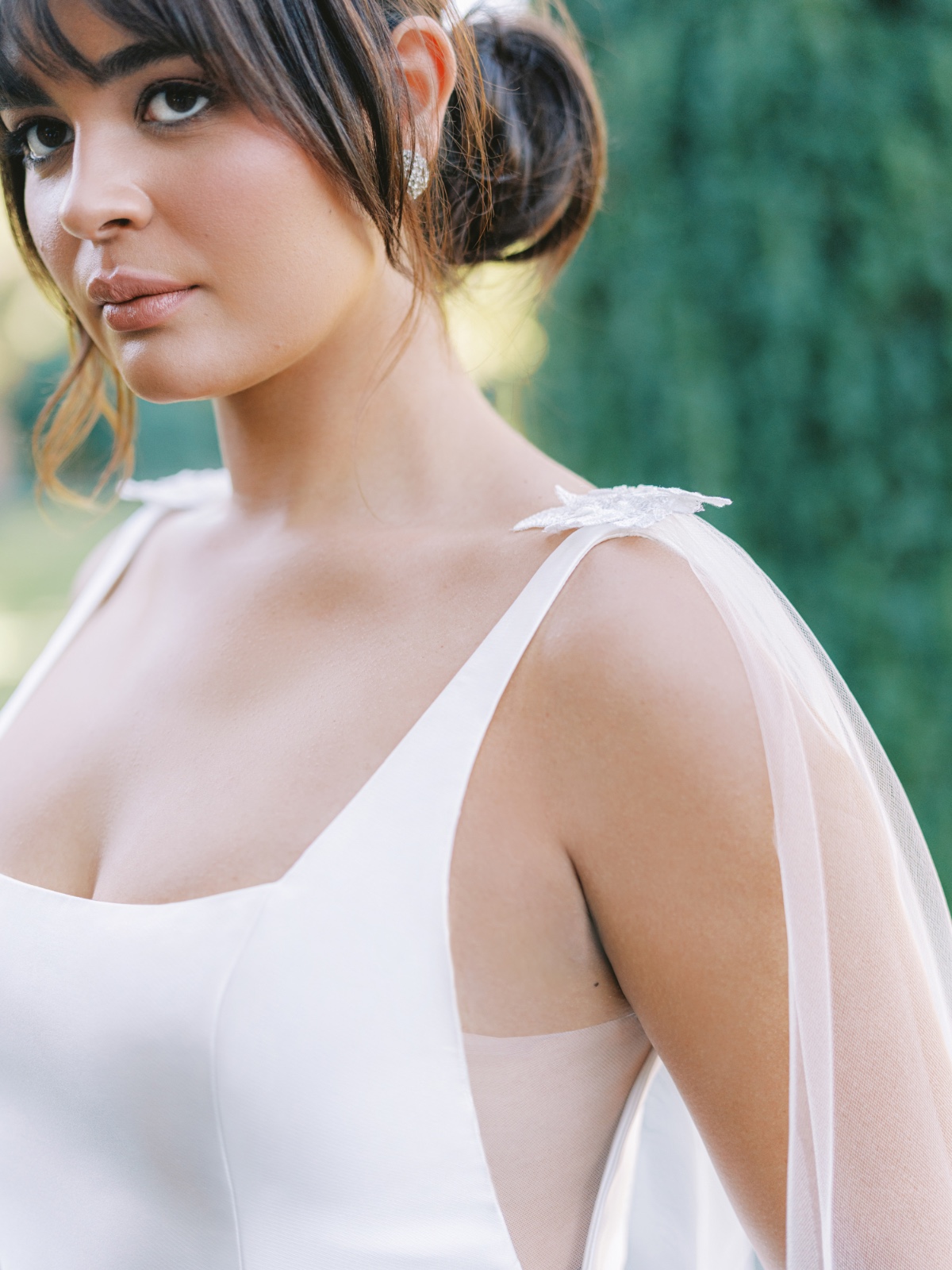 Elegant bride in a white wedding gown, beautiful and serene