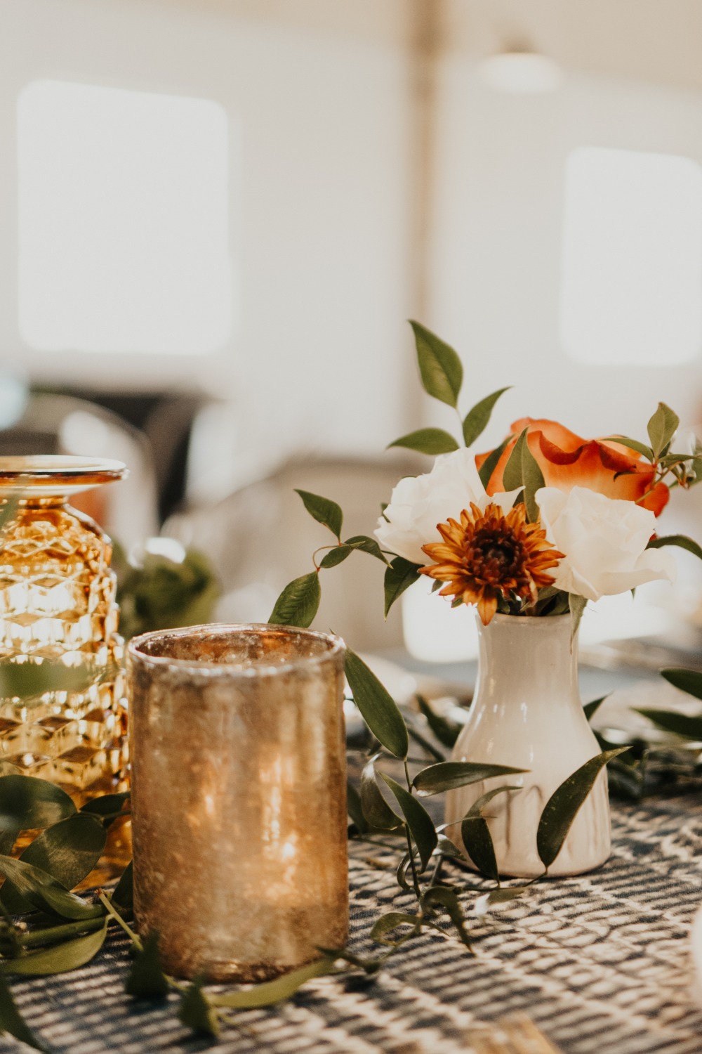 Elegant table setting with flowers and candles for event decor