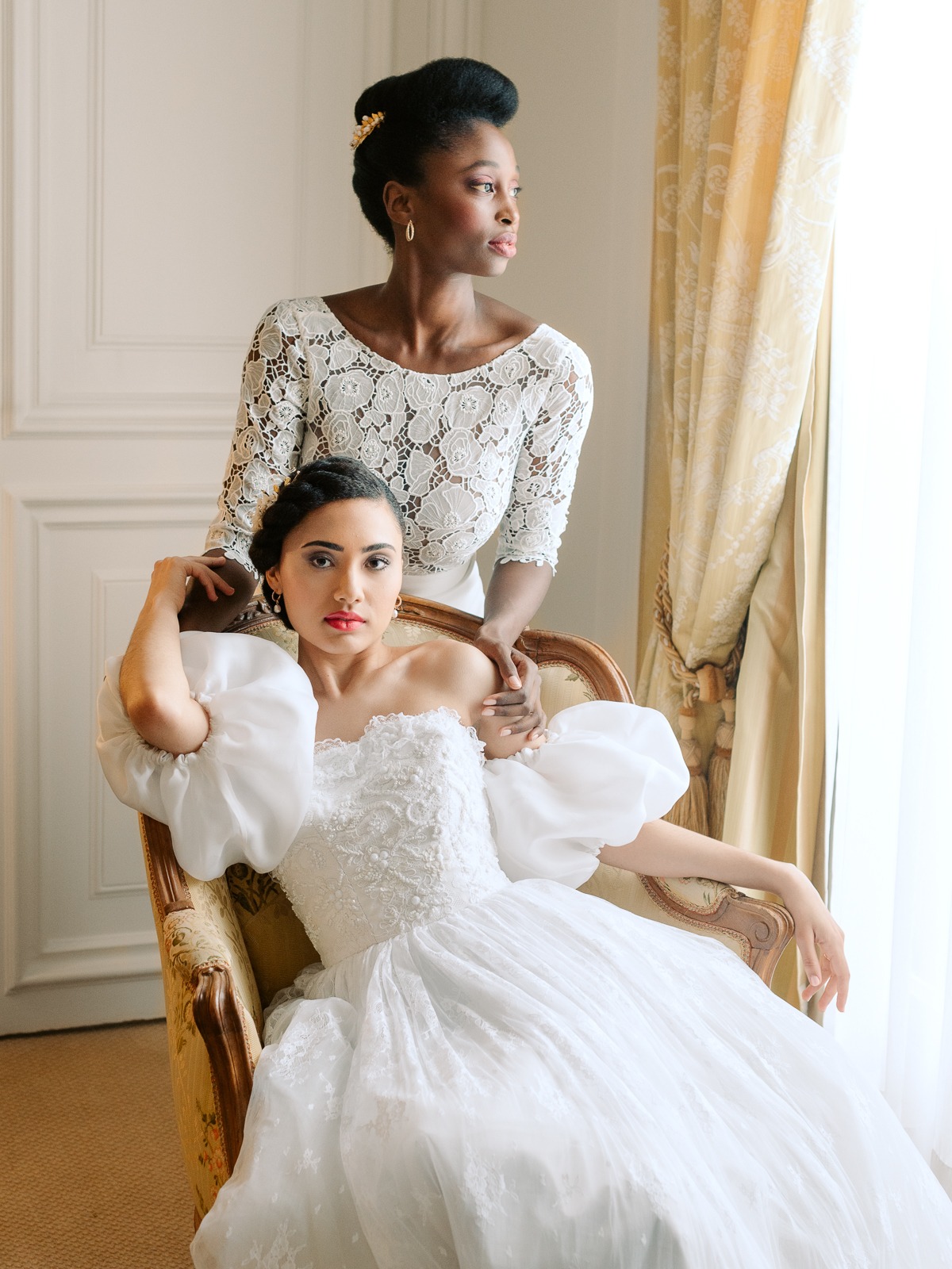 Elegant brides posing in exquisite white wedding dresses