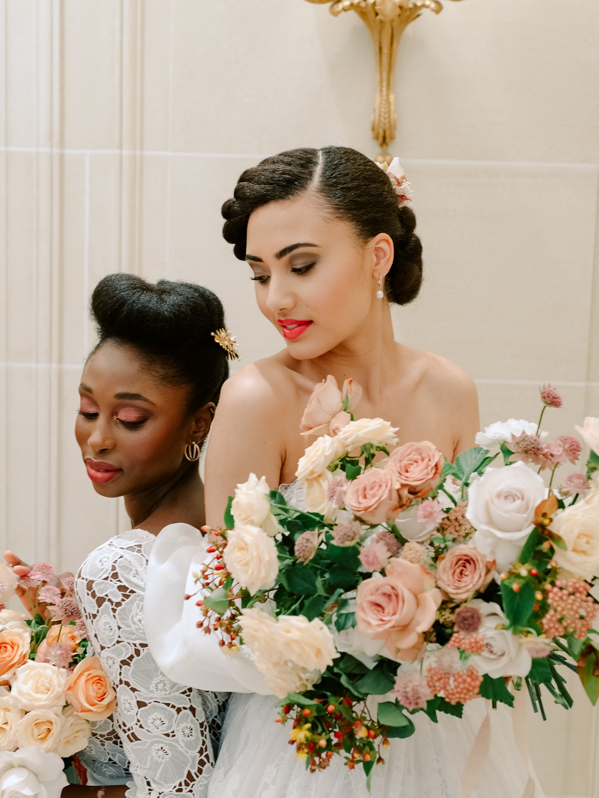 Two beautiful women with flowers, elegant wedding inspiration