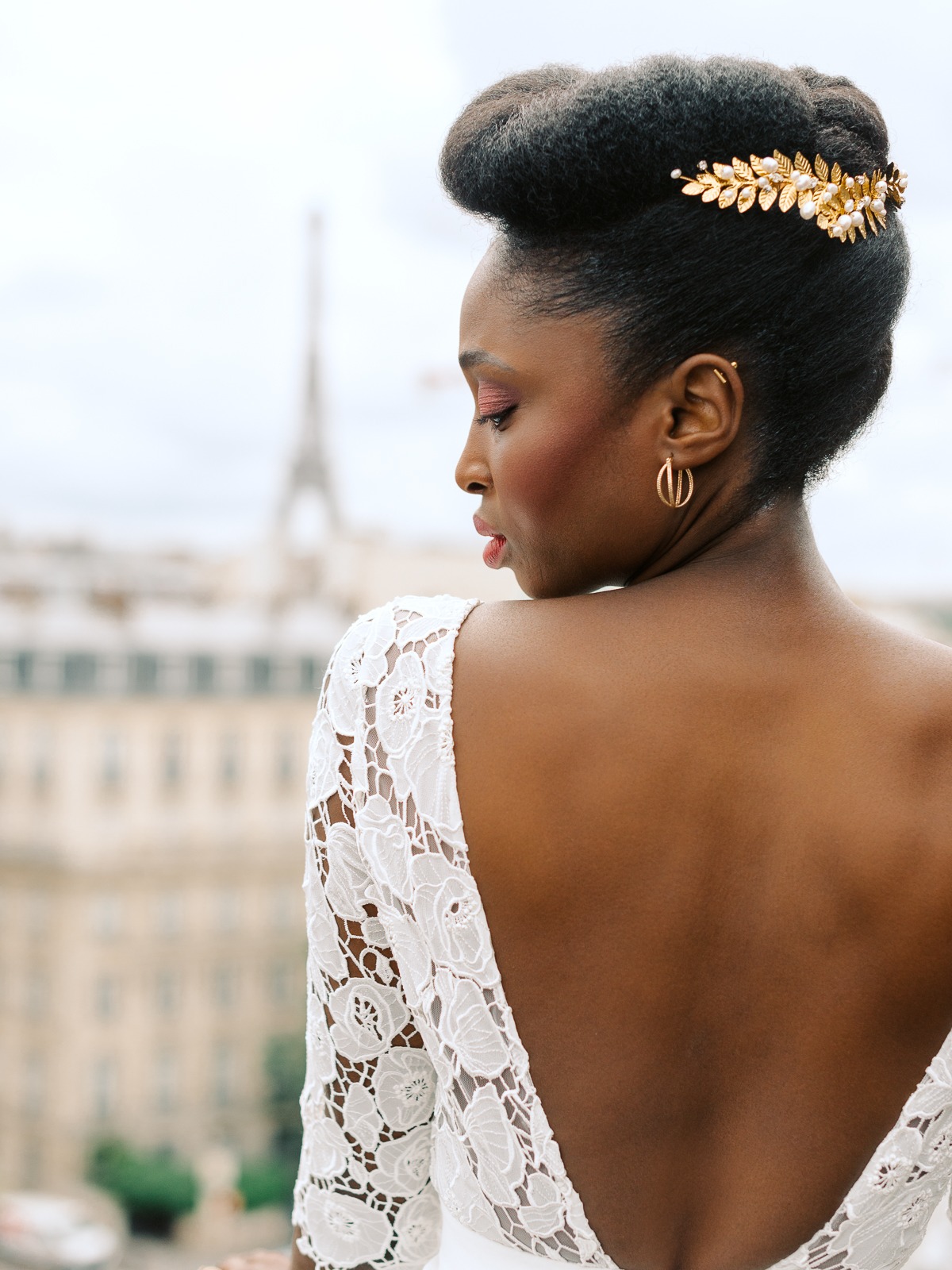 Elegant bride in Paris with gold hairpiece and Eiffel Tower