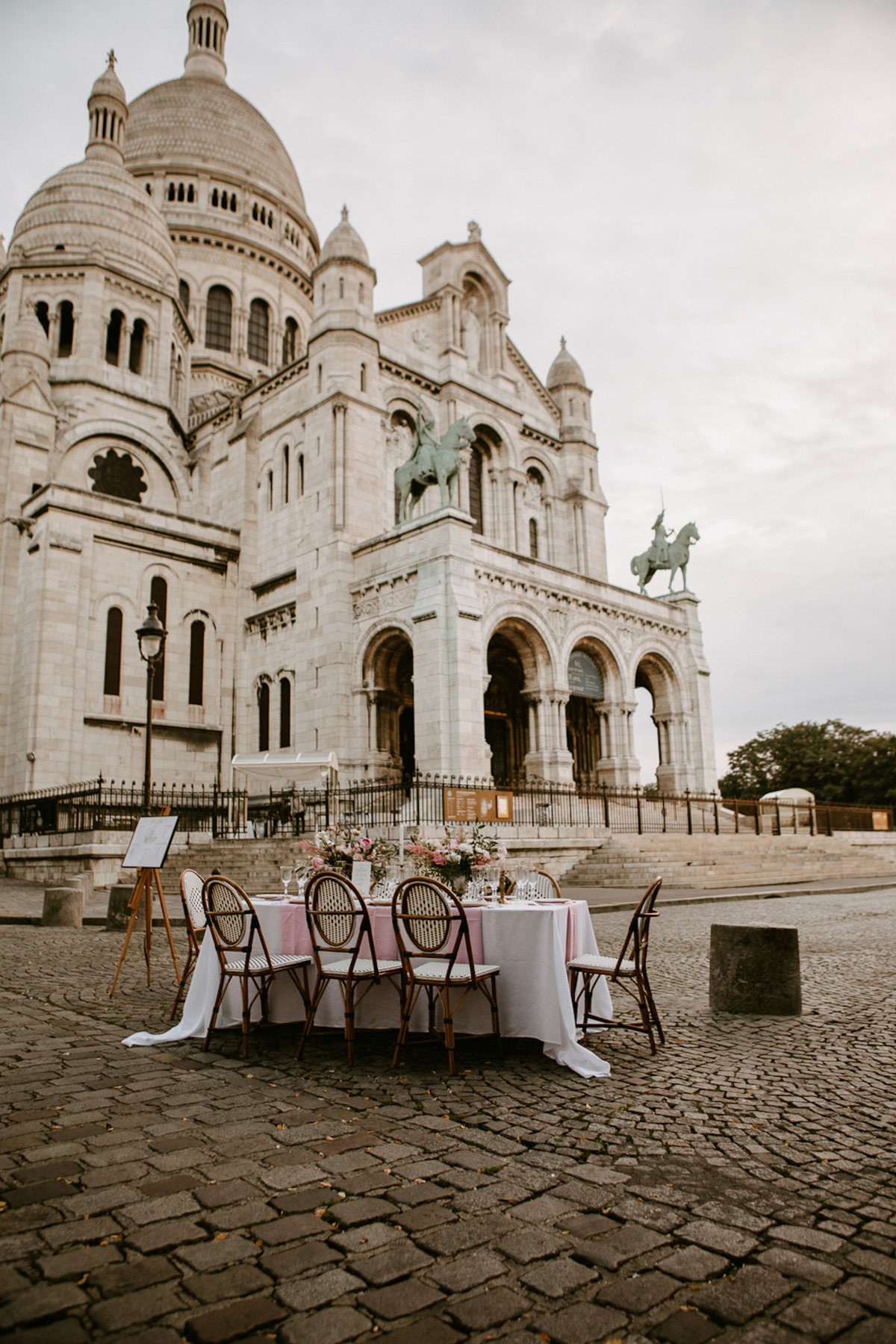 Elegant table set for a romantic dinner in front of Sacre Coeur