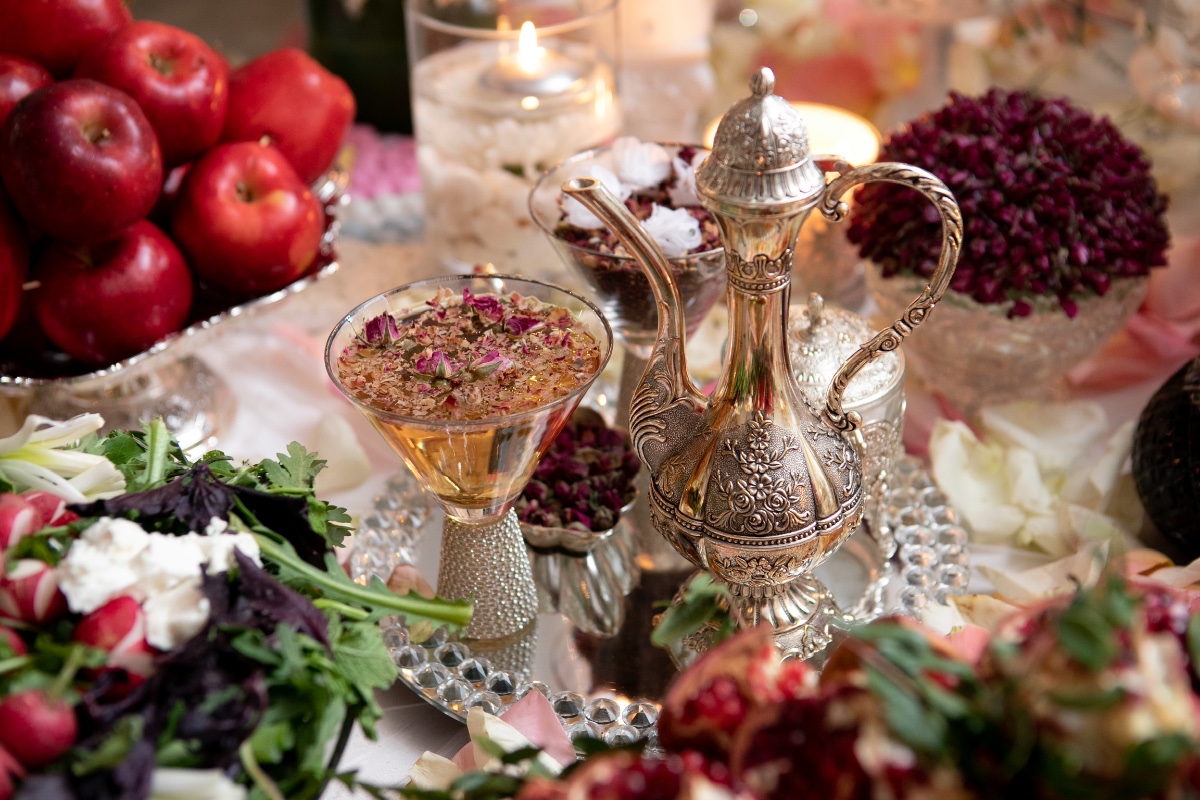 Elegant Persian table setting with silver and red accents