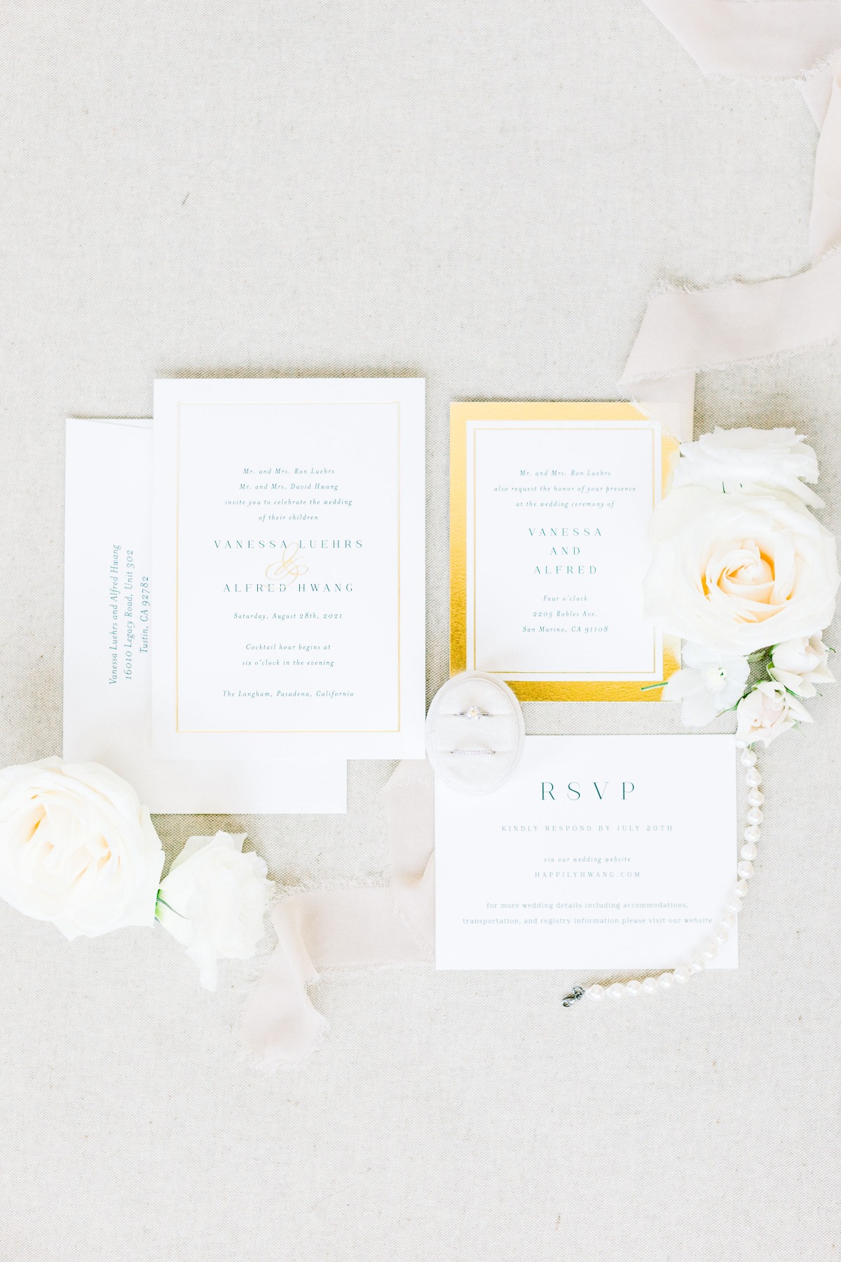 Elegant wedding invitation suite with floral accents