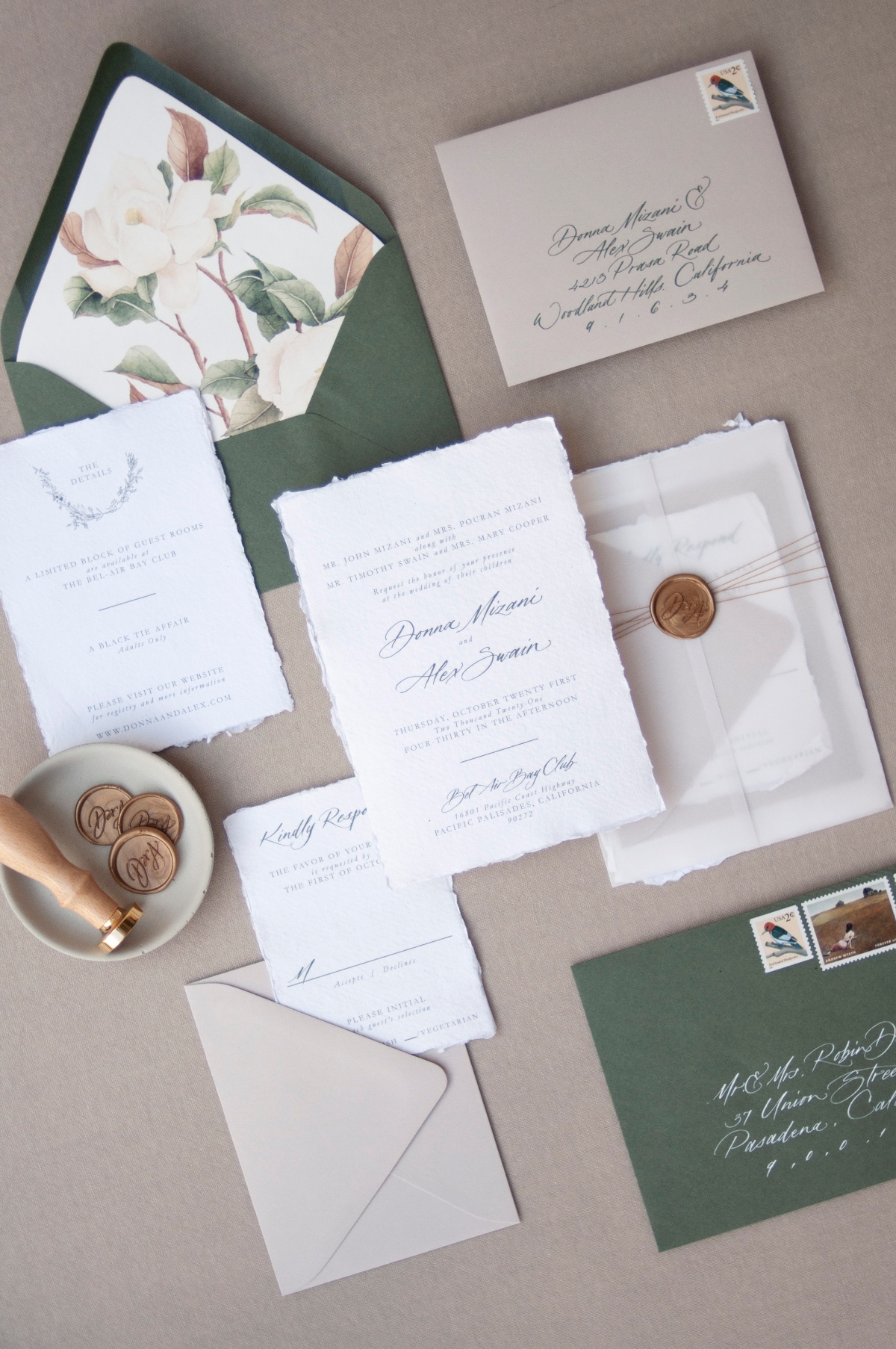 Elegant wedding invitations with floral designs and calligraphy