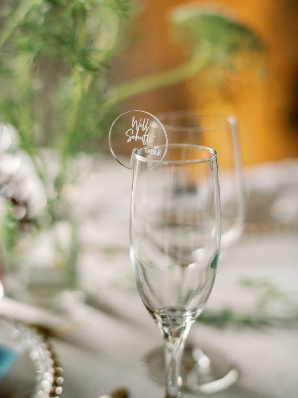 Wedding champagne glass with personalized acrylic name tag