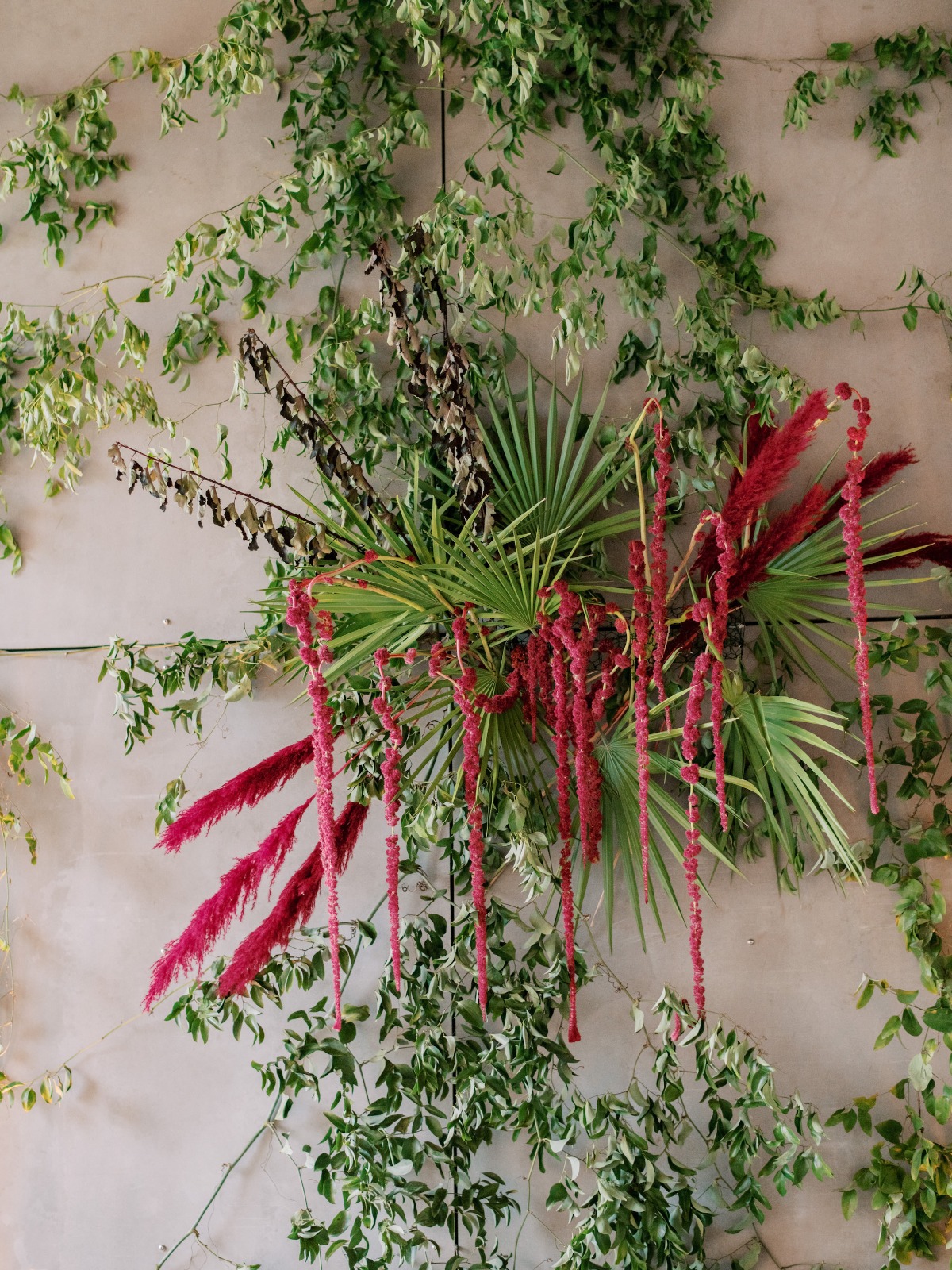 Floral wall art with cascading red amaranthus blooms