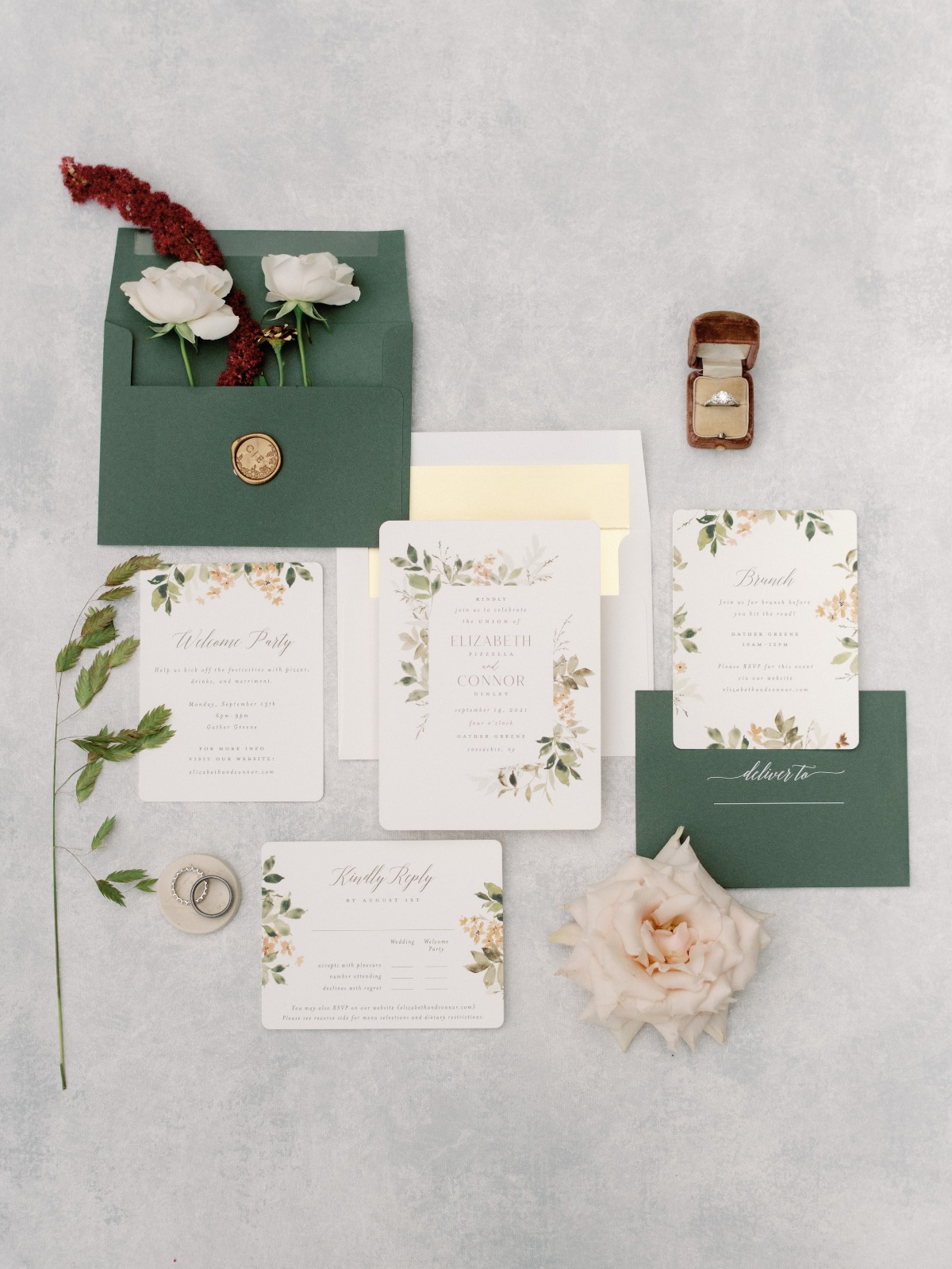 Elegant floral wedding invitation suite with ring details