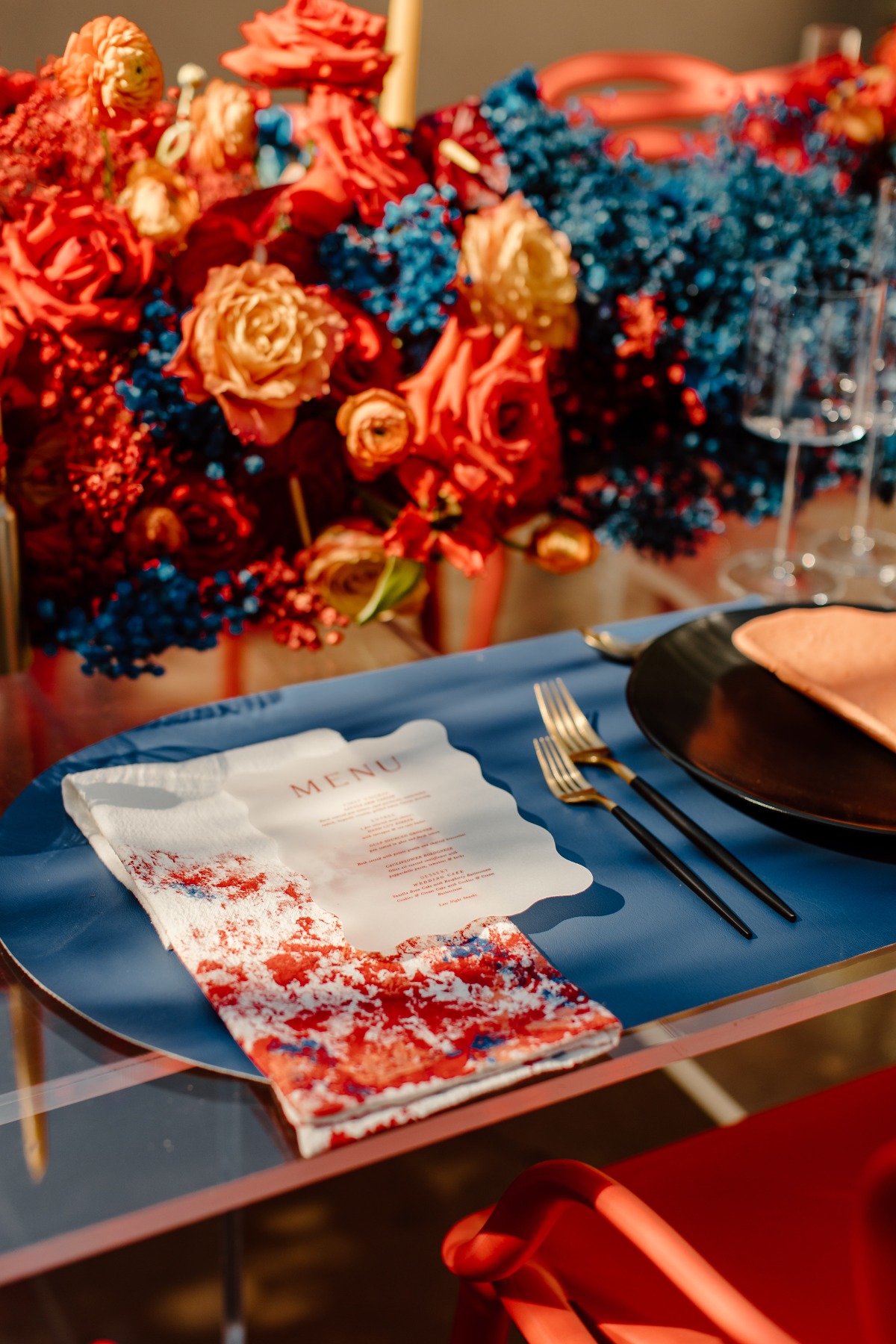 Elegant table setting with floral centerpiece and menu