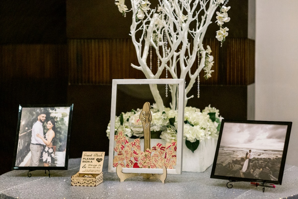 Photos in frames at reception table