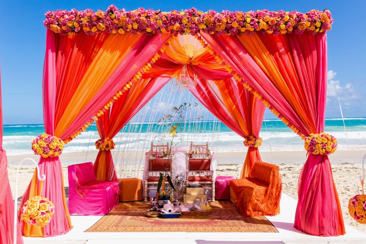 Colorful wedding ceremony set-up on beach