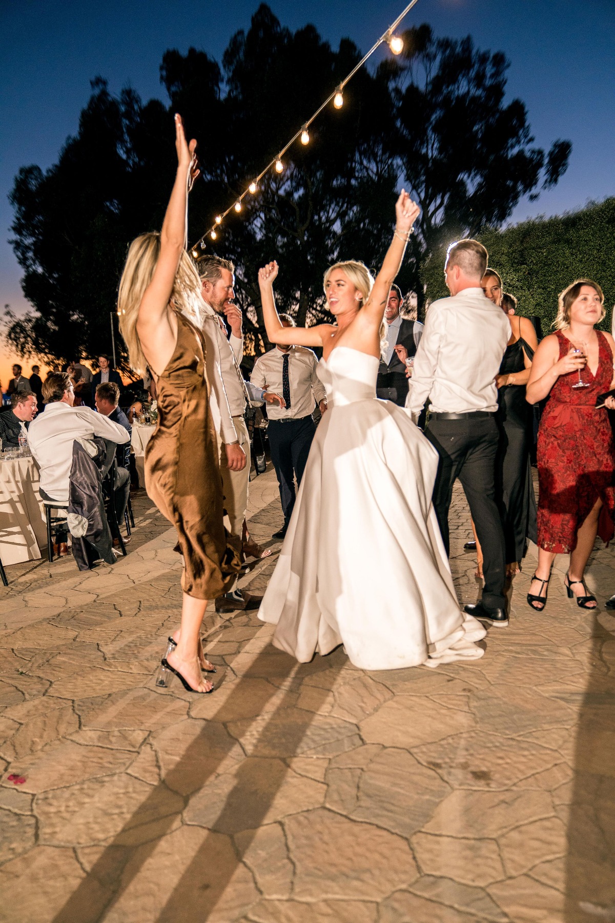 Bride dancing with guests