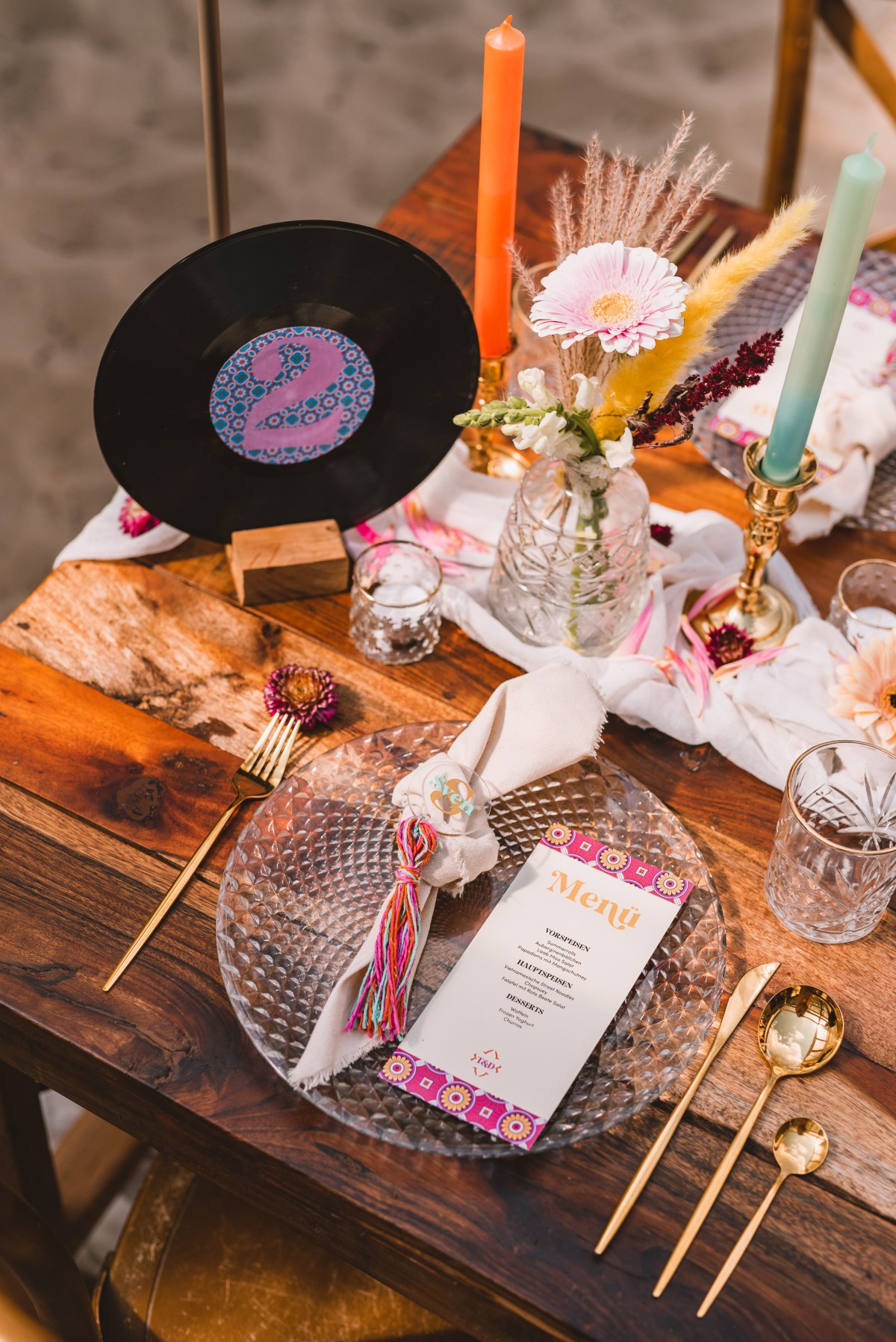 Menu and place setting with vinyl record table number and centerpiece objects