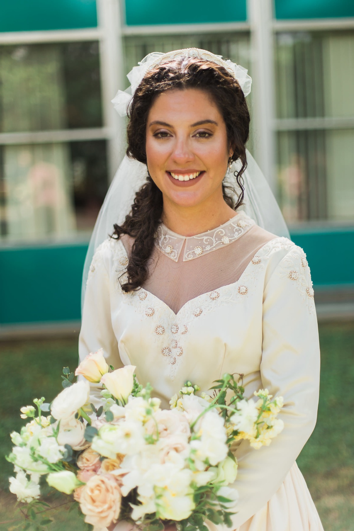 bride wears vintage wedding dress