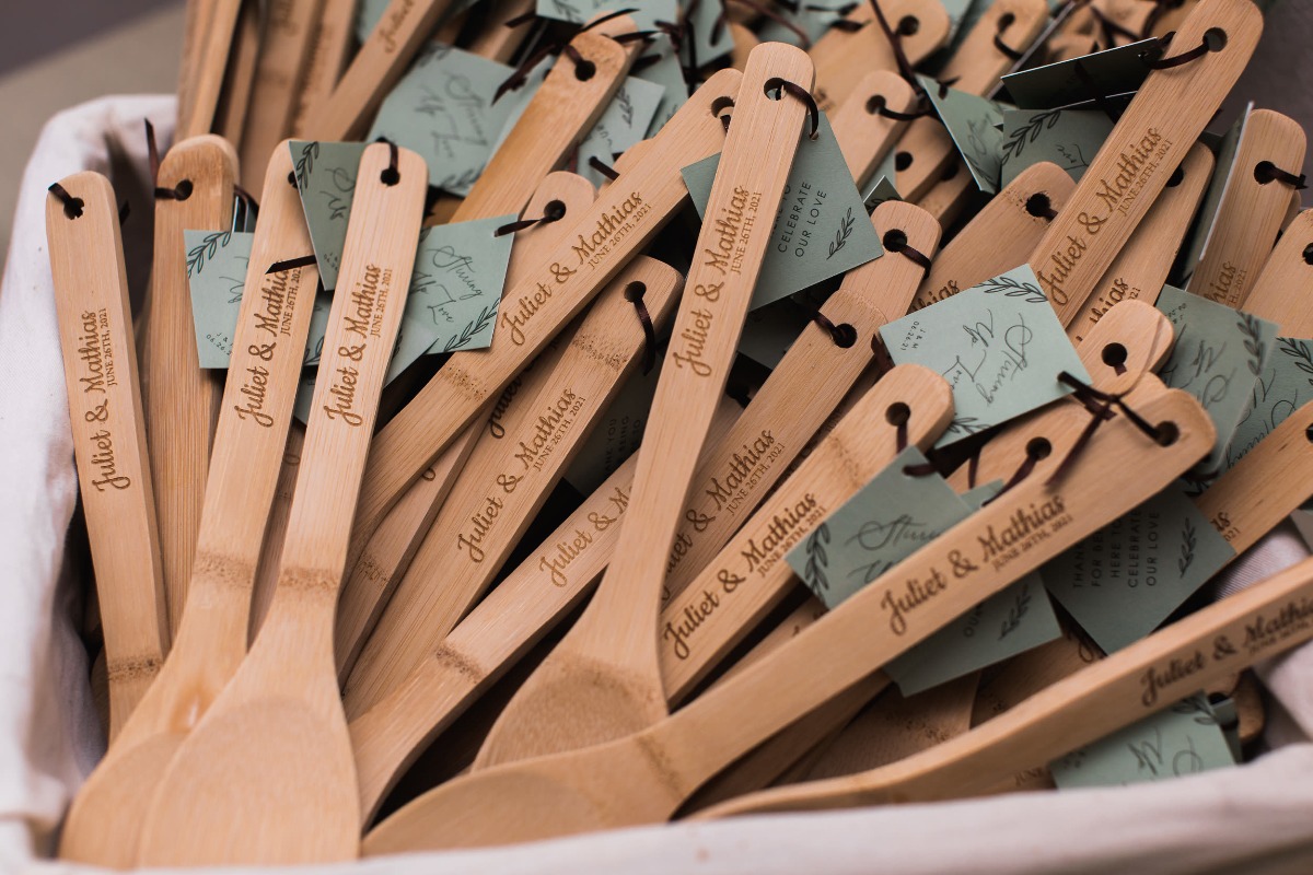 Bride and Groom's names are engraved in spoons as wedding favors