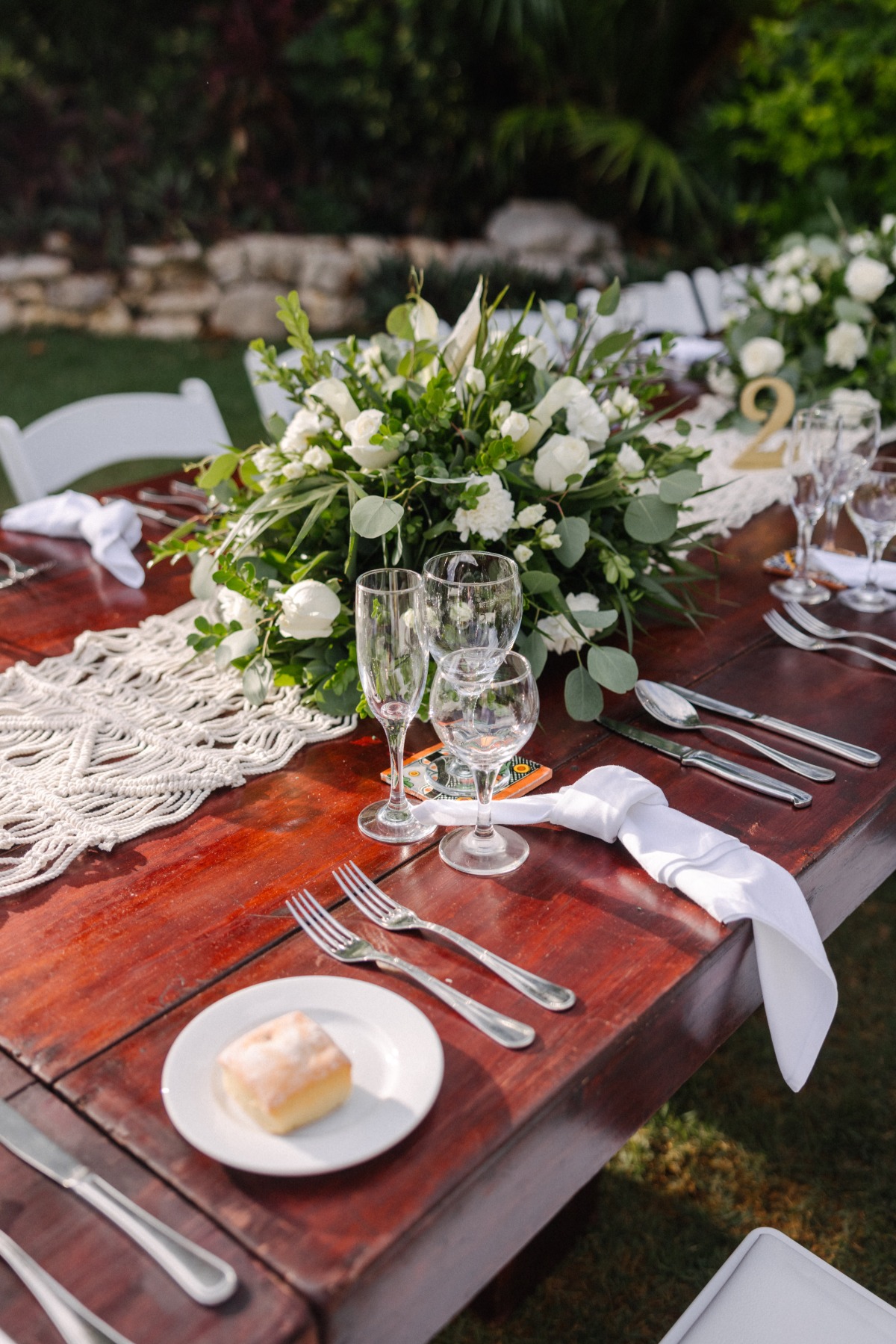 Close-up of reception centerpiece and table setting