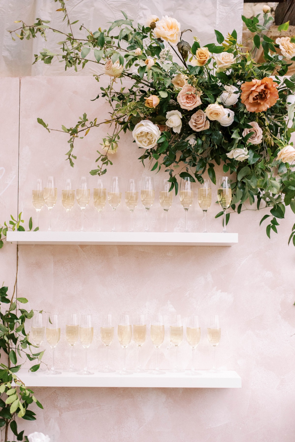 Champagne wall with floral decor
